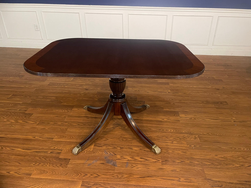 https://a.1stdibscdn.com/traditional-mahogany-breakfast-table-by-leighton-hall-for-sale-picture-11/f_44162/f_366603121697556034824/IMG_9168_master.jpeg