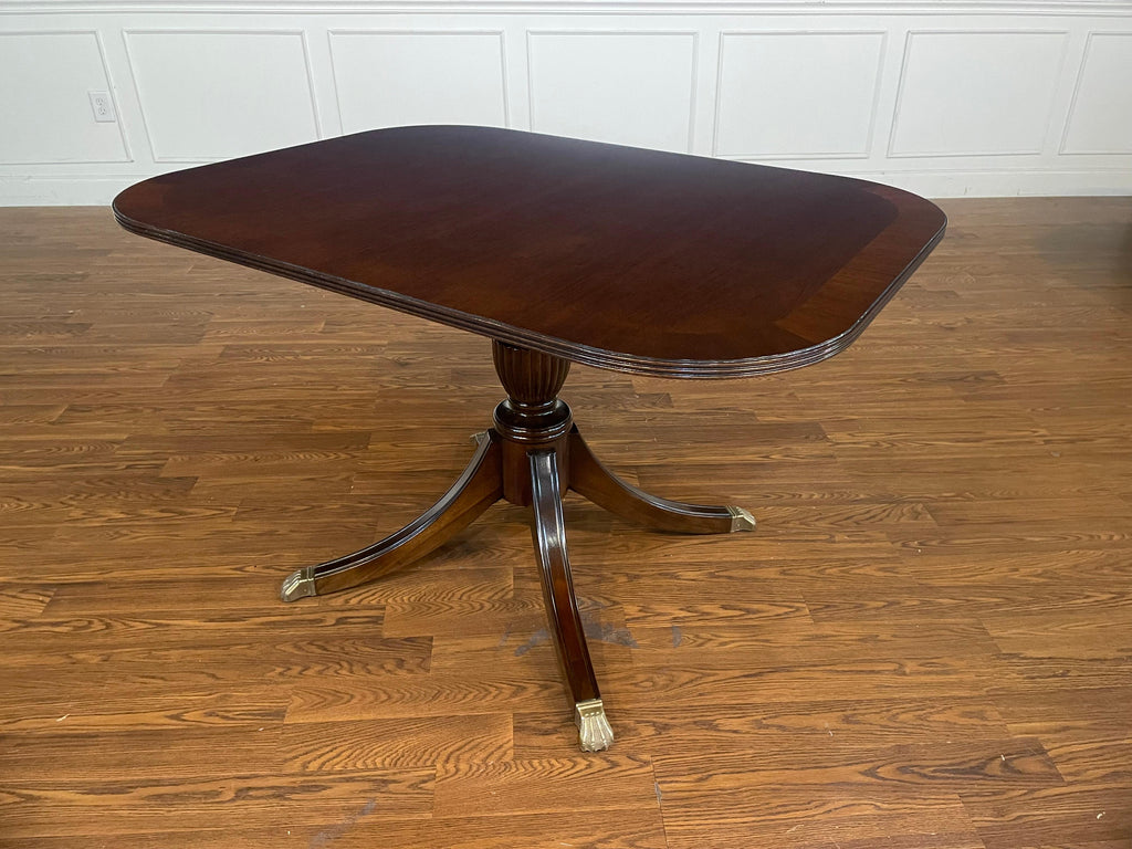 https://a.1stdibscdn.com/traditional-mahogany-breakfast-table-by-leighton-hall-for-sale-picture-8/f_44162/f_366603121697555989520/IMG_9183_master.jpeg