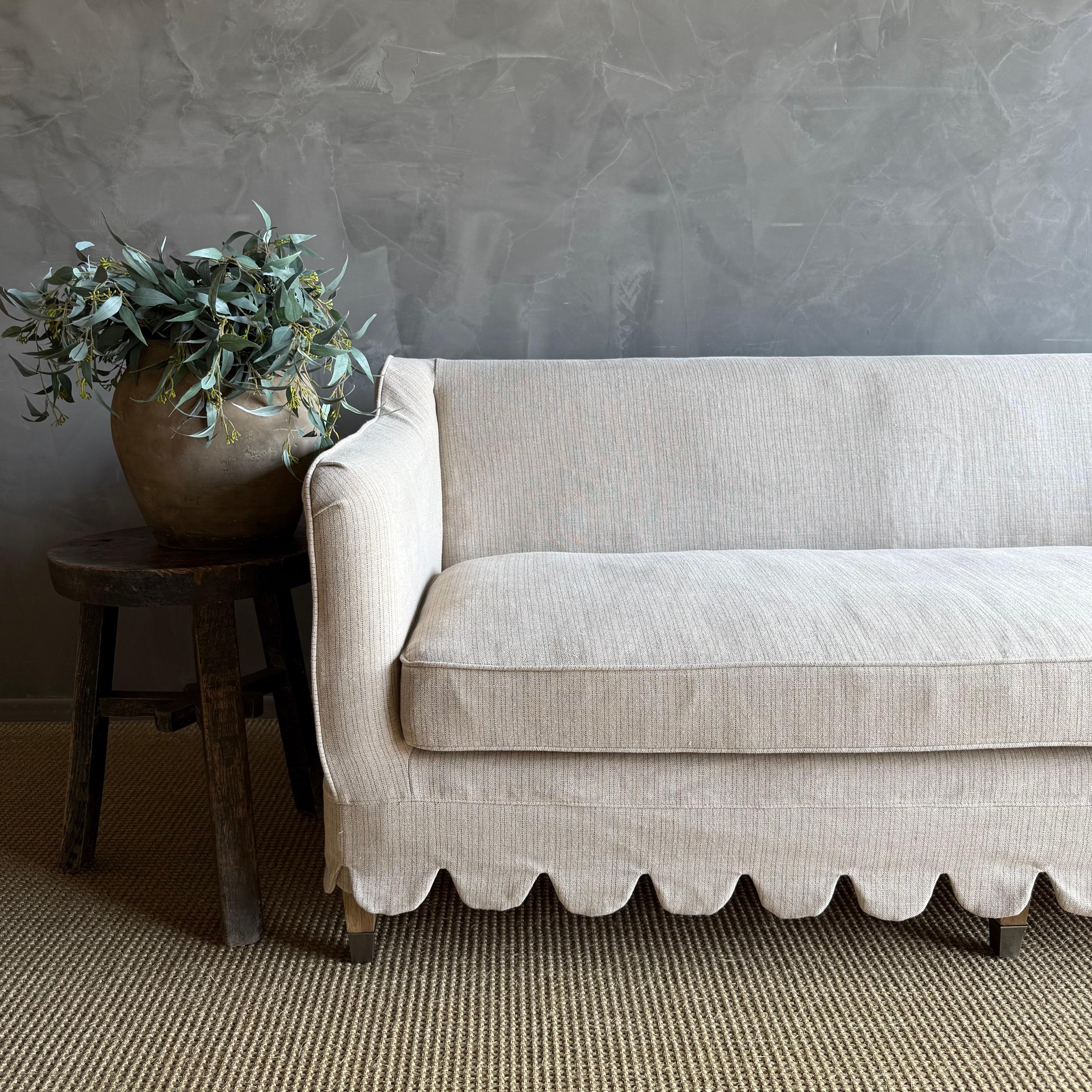 https://a.1stdibscdn.com/madison-slip-covered-ticking-stripe-linen-sofa-with-scallop-skirt-down-cushion-for-sale-picture-4/f_18223/f_470032121760138165157/IMG_9475_master.jpg