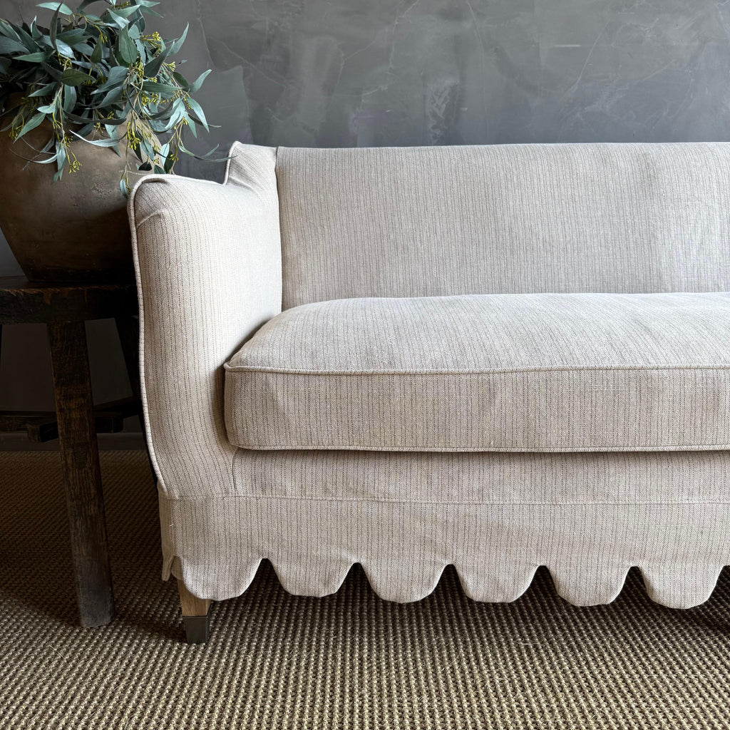 https://a.1stdibscdn.com/madison-slip-covered-ticking-stripe-linen-sofa-with-scallop-skirt-down-cushion-for-sale-picture-5/f_18223/f_470032121760138165495/IMG_9477_master.jpg