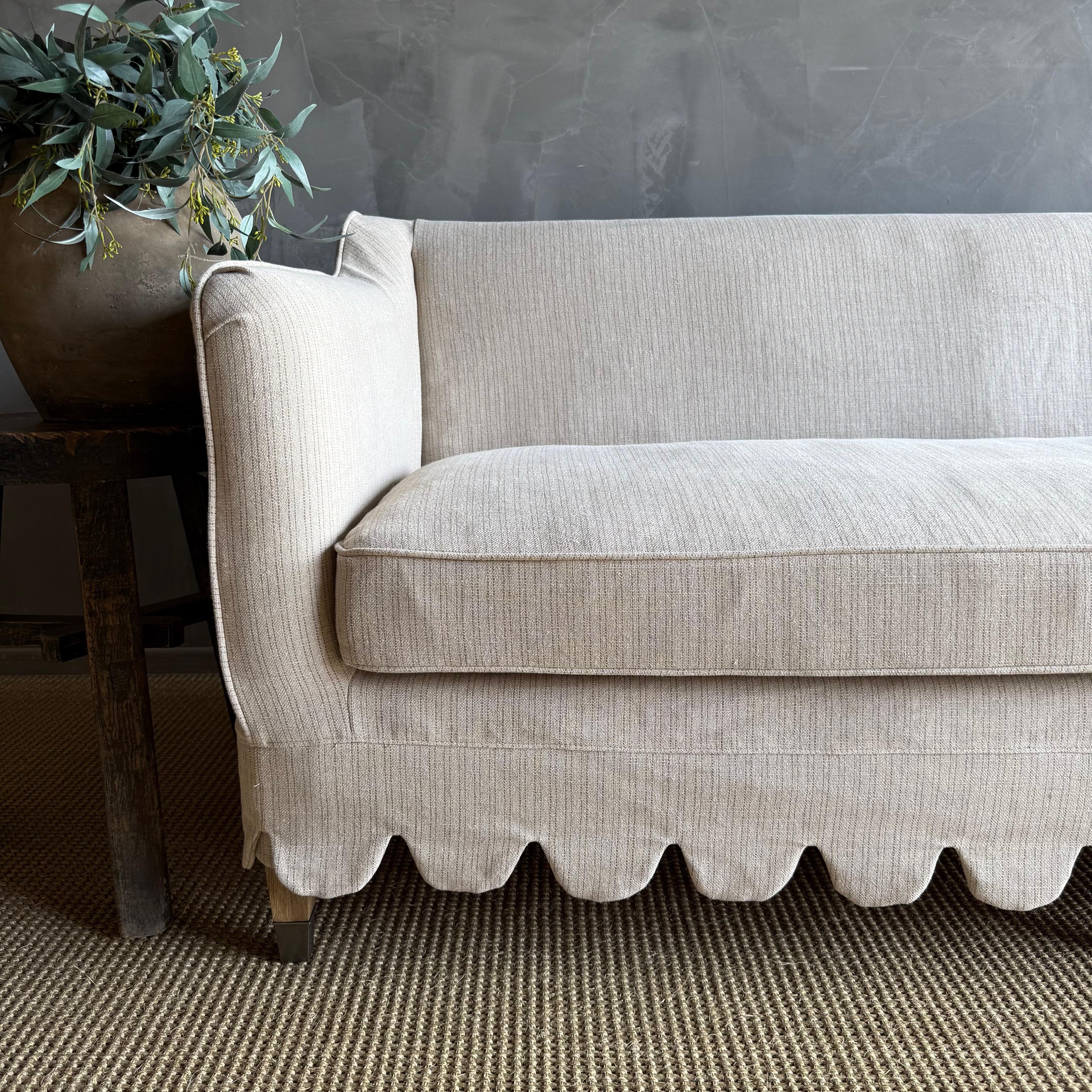 https://a.1stdibscdn.com/madison-slip-covered-ticking-stripe-linen-sofa-with-scallop-skirt-down-cushion-for-sale-picture-5/f_18223/f_470032121760138165495/IMG_9477_master.jpg