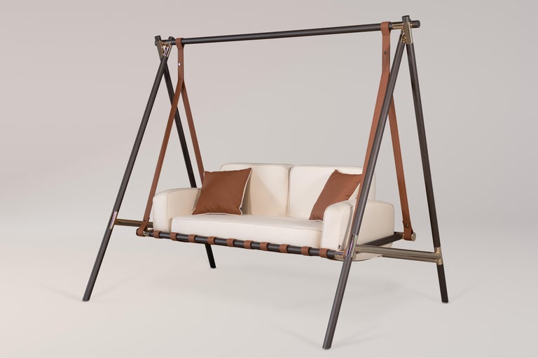 https://a.1stdibscdn.com/outdoor-swing-with-stainless-steel-structure-and-patterned-fabric-for-sale-picture-11/f_56702/f_465866621773674179451/IMG_9488_Edit_studio__master.jpg?width=768