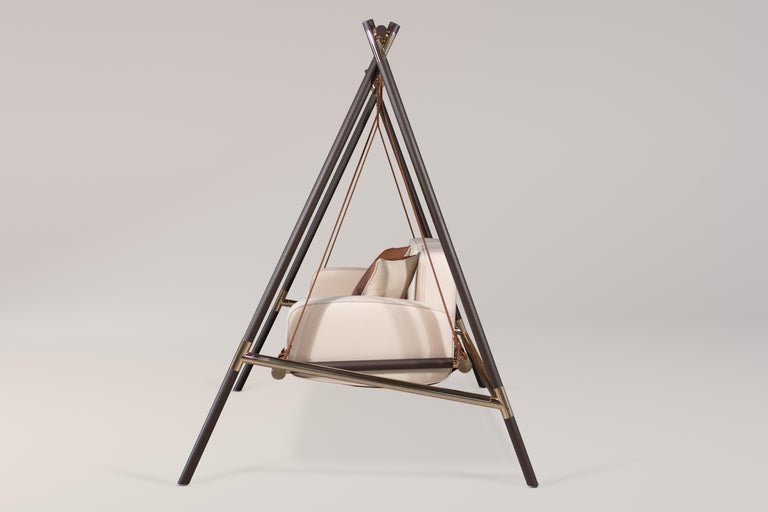 https://a.1stdibscdn.com/outdoor-swing-with-stainless-steel-structure-and-patterned-fabric-for-sale-picture-10/f_56702/f_465866621773674179291/IMG_9512_Edit_studio__master.jpg?width=768