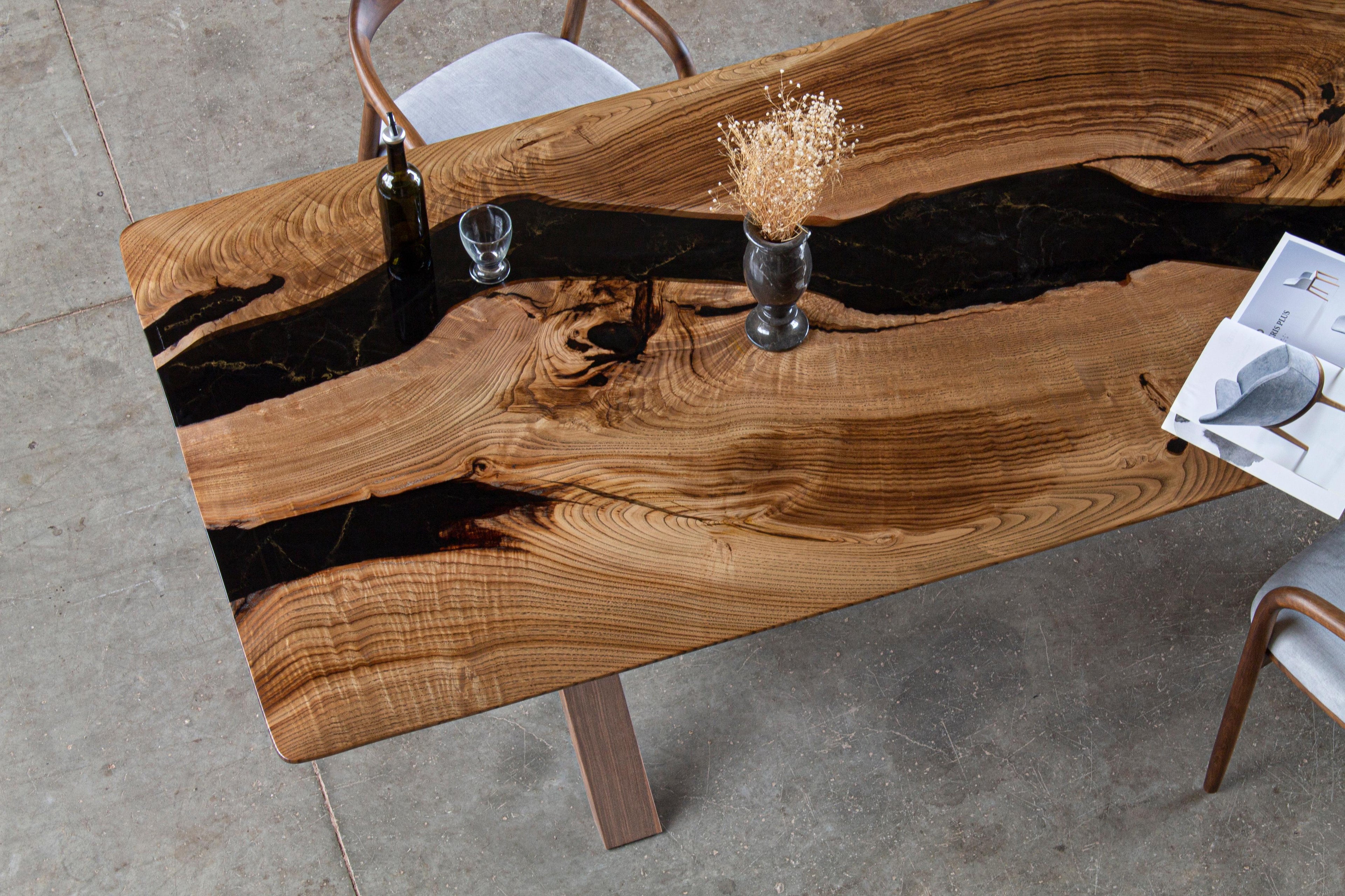 https://a.1stdibscdn.com/live-edge-table-epoxy-resin-dining-table-custom-epoxy-resin-walnut-table-for-sale-picture-3/f_91932/f_421753221730806692853/IMG_9513_copy_master.jpg