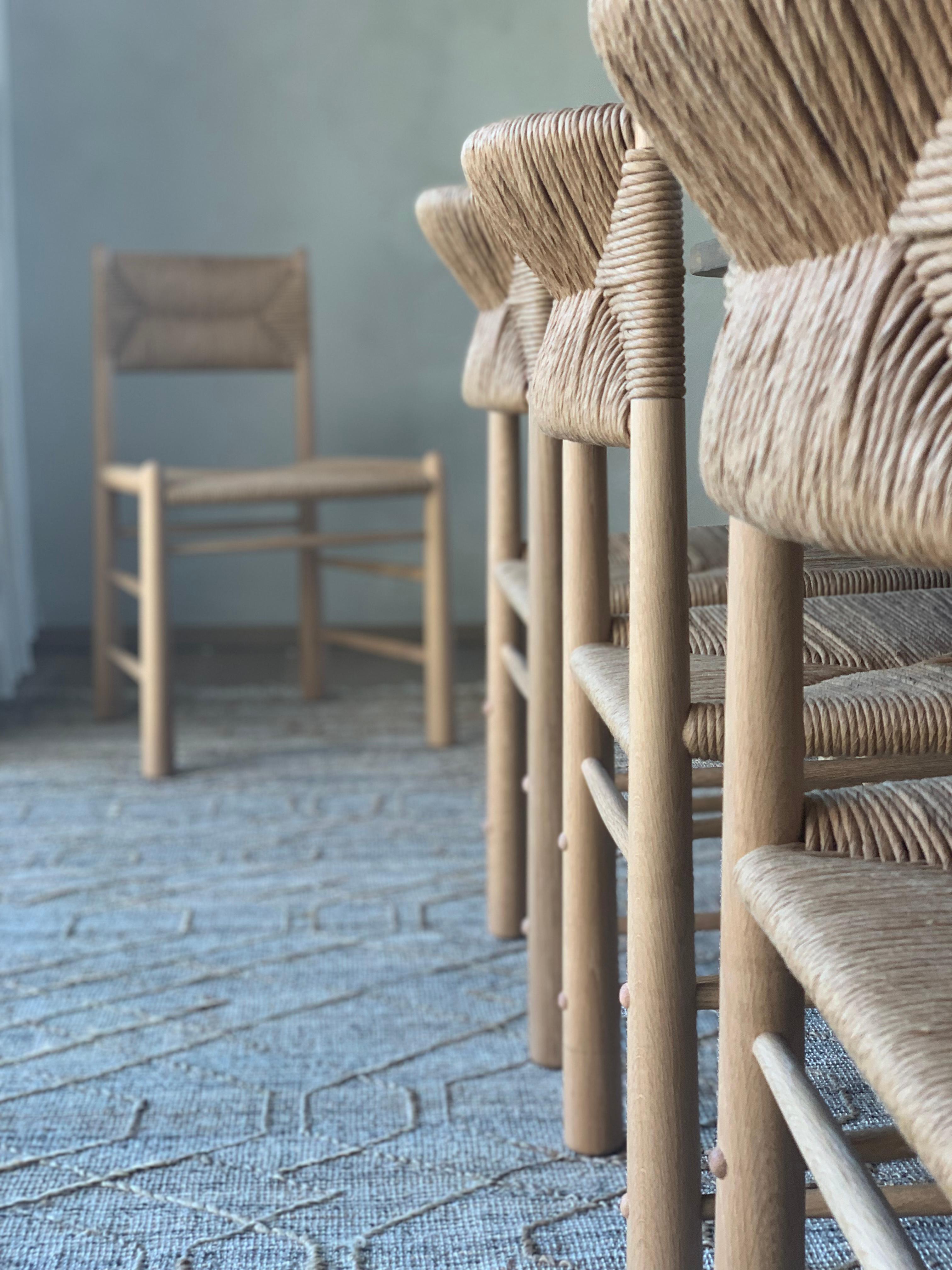 https://a.1stdibscdn.com/ewa-dining-chair-white-oak-and-natural-fibre-rush-for-sale-picture-5/f_26683/f_275985821646255488195/IMG_9589_master.jpg