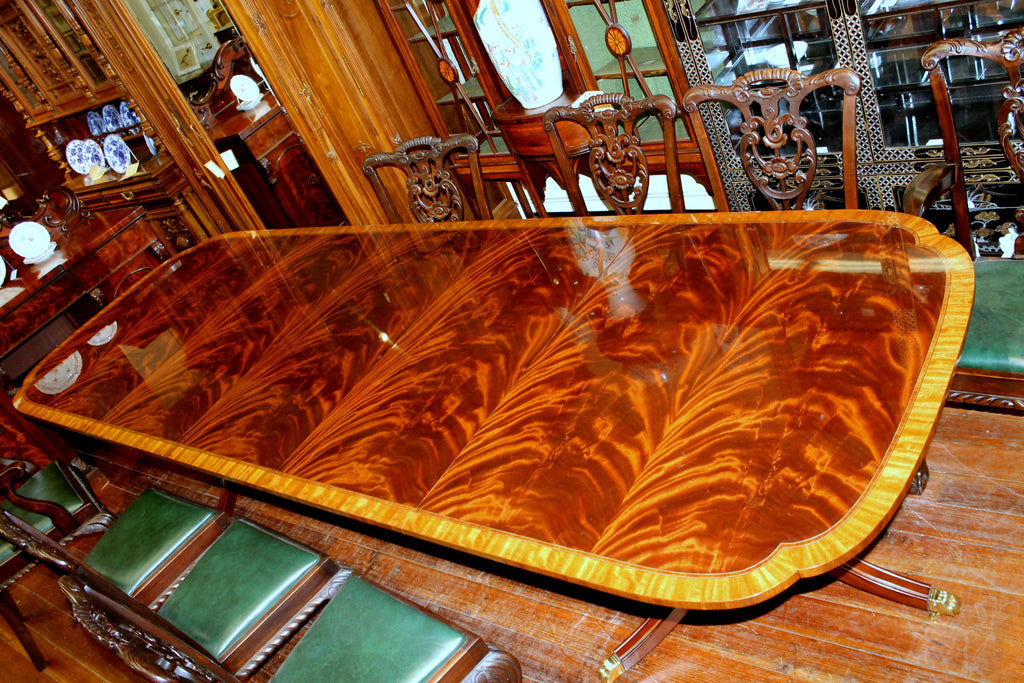 https://a.1stdibscdn.com/bench-made-reprod-inlaid-flame-mahogany-sheraton-style-three-leaf-dining-table-for-sale-picture-18/f_18913/f_251442021630533052178/IMG_9758_master.JPG