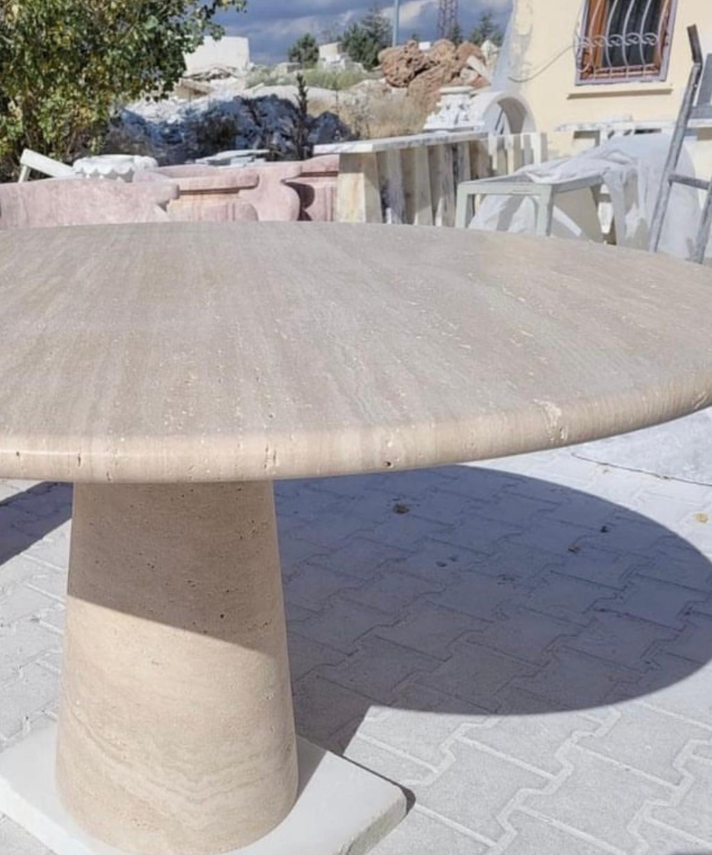 https://a.1stdibscdn.com/cream-travertine-round-dining-table-in-the-style-of-1970-angelo-mangiarotti-for-sale-picture-2/f_80522/f_410004521723150874273/IMG_EEAC3569A38C_1_master.jpeg
