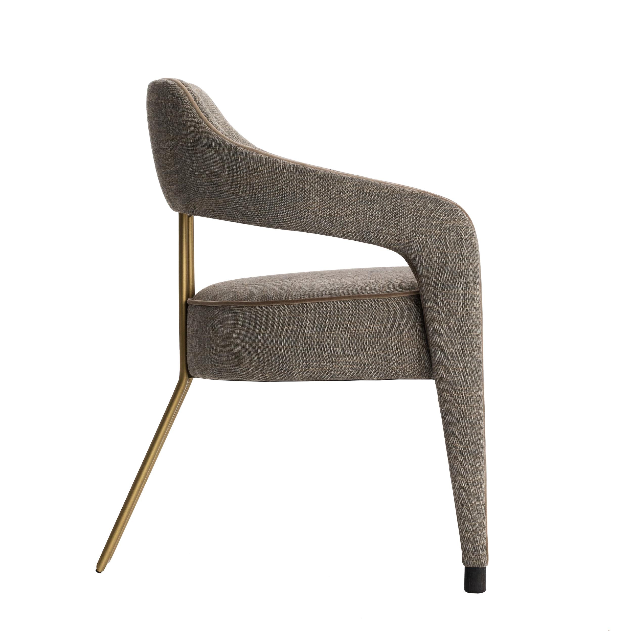https://a.1stdibscdn.com/invicta-ii-dining-chair-with-metal-gilded-back-leg-for-sale-picture-4/f_52952/1591271754207/INVICTA_II_LADO_master.jpg