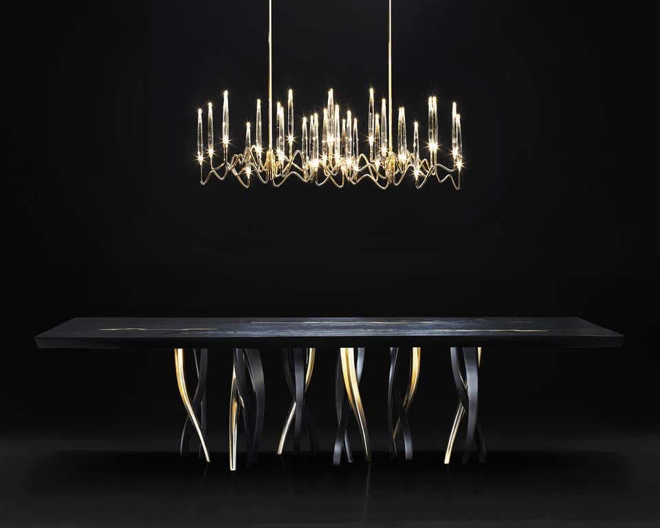 https://a.1stdibscdn.com/black-and-gold-ash-wood-dining-table-made-in-italy-in-stock-in-los-angeles-for-sale-picture-5/f_49571/f_190599221589383888764/Il_Pezzo_8_Black_Table_1_master_master.jpg