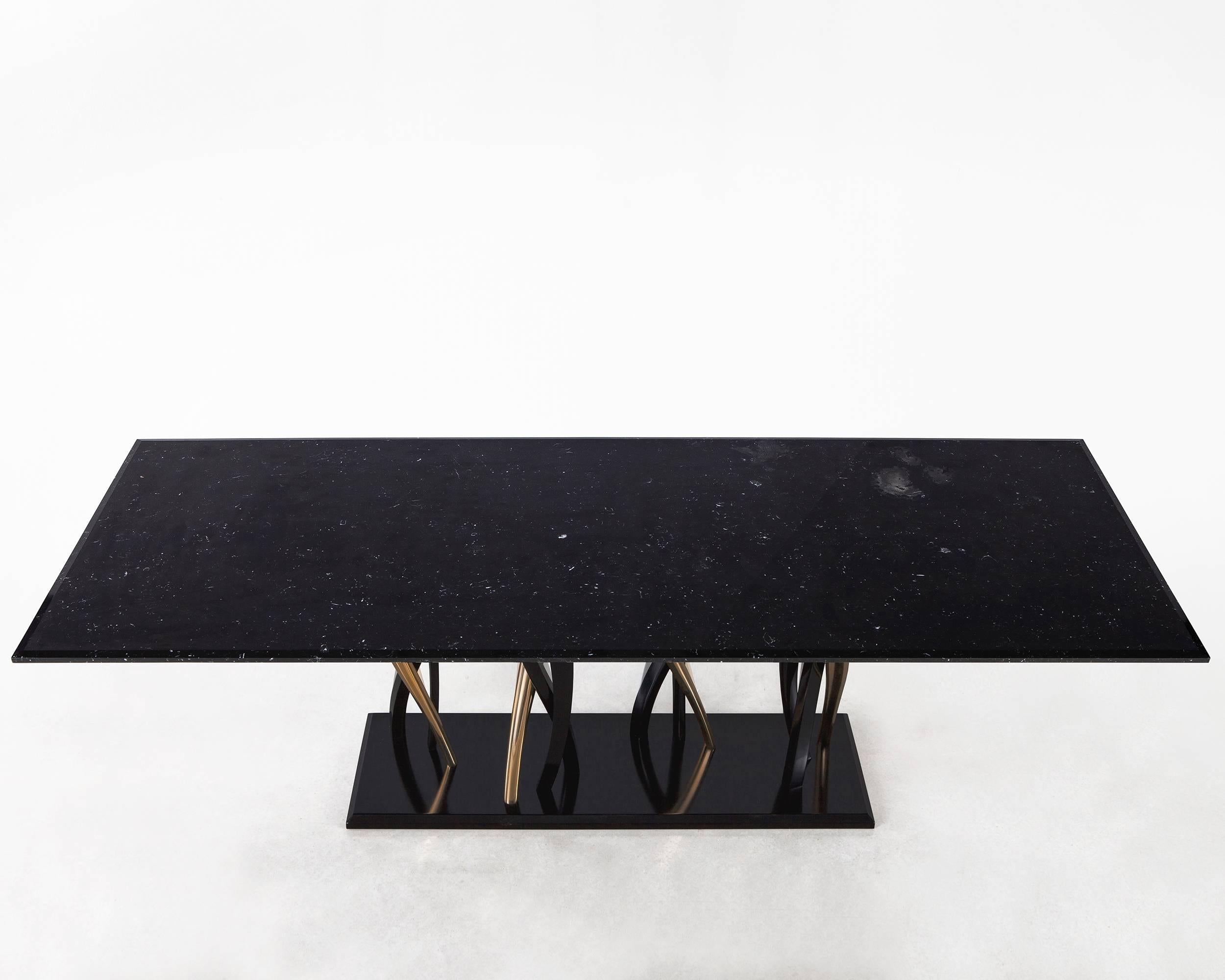 https://a.1stdibscdn.com/archivesE/upload/f_31243/f_95207711515589237978/Il_Pezzo_8_Marble_Table_black_and_gold_3_master.jpg