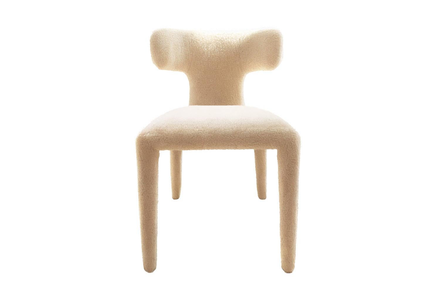 https://a.1stdibscdn.com/instinto-dining-chair-pink-boucle-for-sale-picture-7/f_105132/f_456645021751278782554/Instinto_1_2_boucle_white_master.jpg