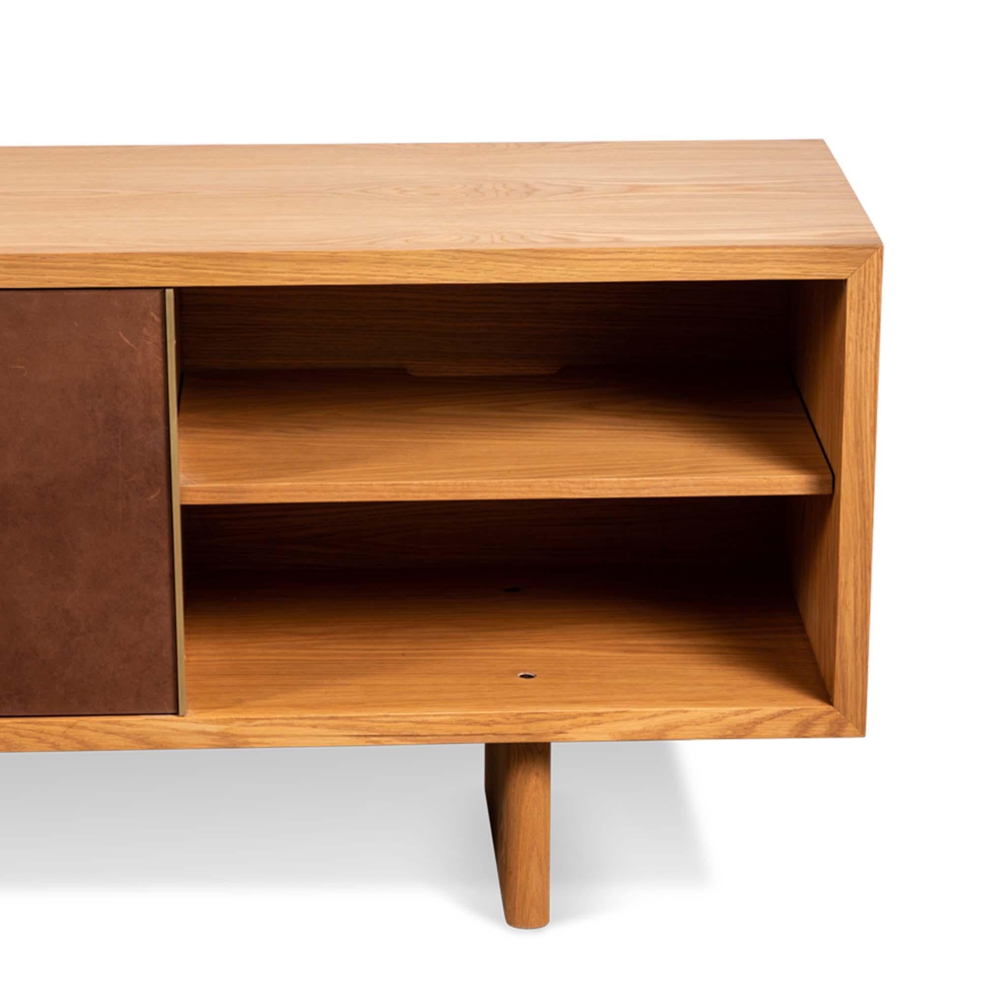 https://a.1stdibscdn.com/oak-and-leather-inverness-media-cabinet-by-lawson-fenning-for-sale-picture-4/f_8060/f_350400621688160817913/InvernessMediaCabinet4_master.jpg