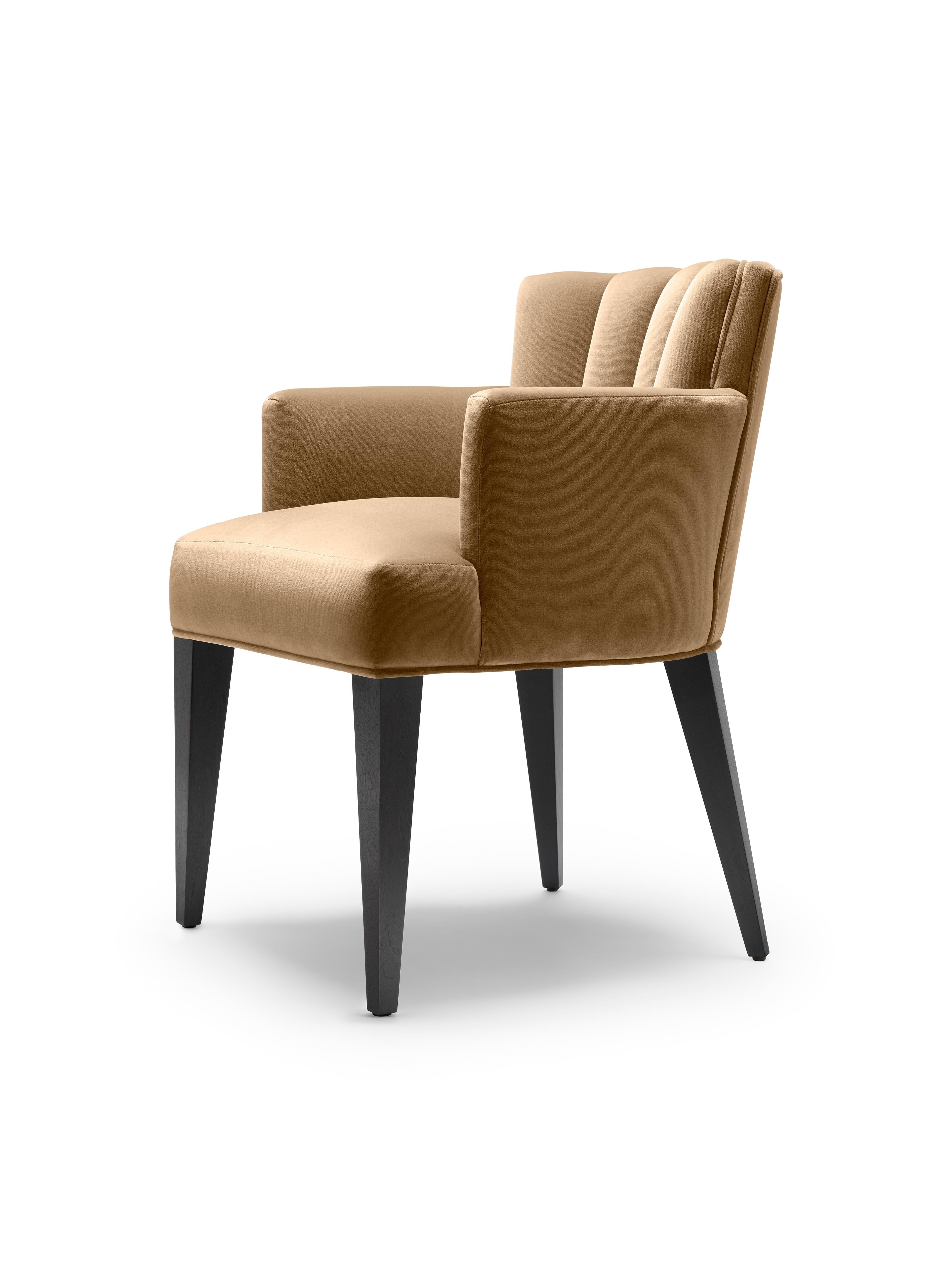 https://a.1stdibscdn.com/contemporary-isabella-carver-chair-in-mocha-cotton-velvet-with-black-walnut-legs-for-sale-picture-2/f_27813/f_456677321751292223447/Isabella_Carver_DiningChair_130Tan_2_master.jpg