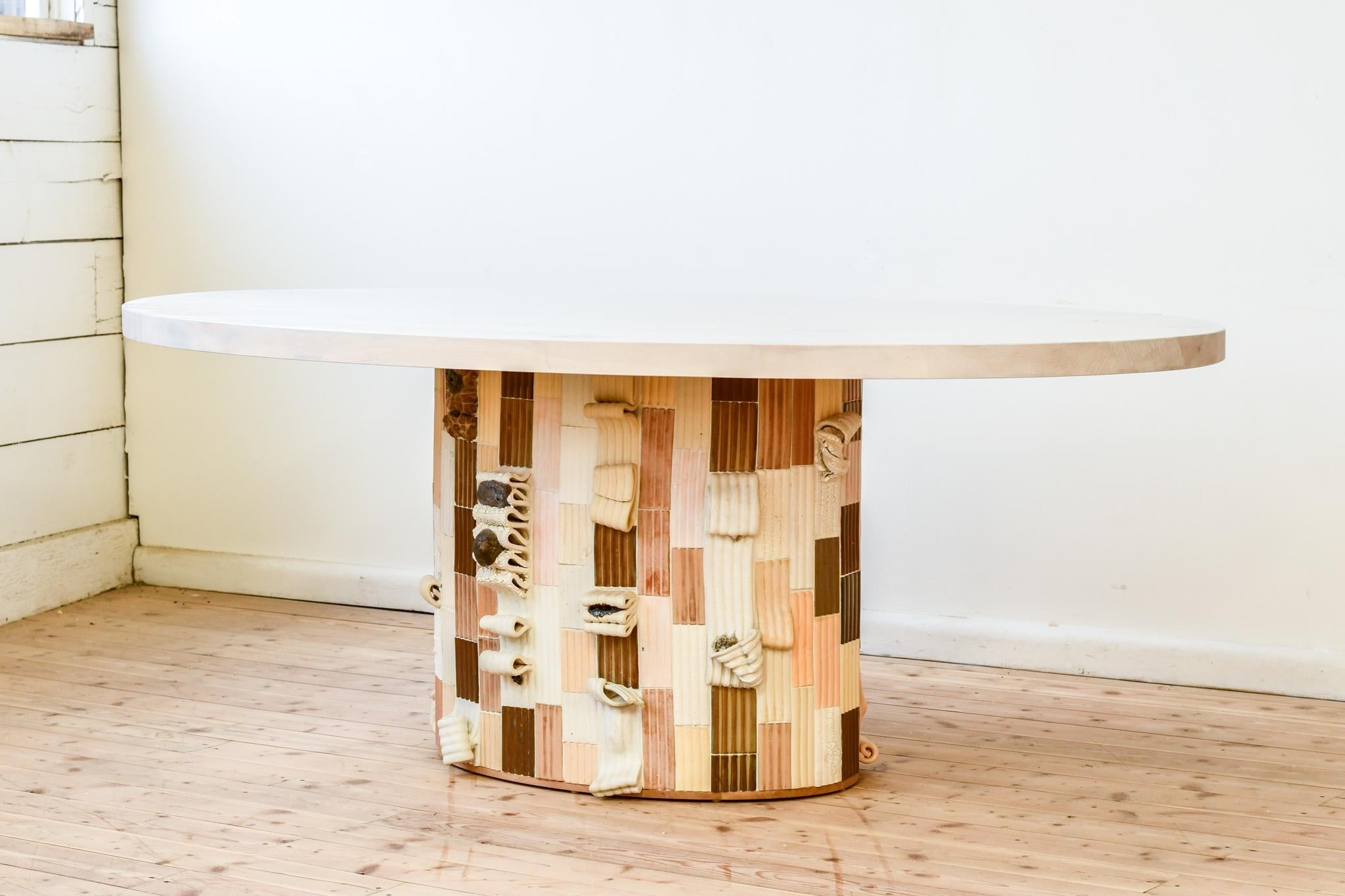 https://a.1stdibscdn.com/sarcophagus-pedestal-dining-table-in-hand-sculpted-ceramic-tiles-for-sale-picture-4/f_35833/f_388666021710534817514/_JMJ6604_2_master.jpg