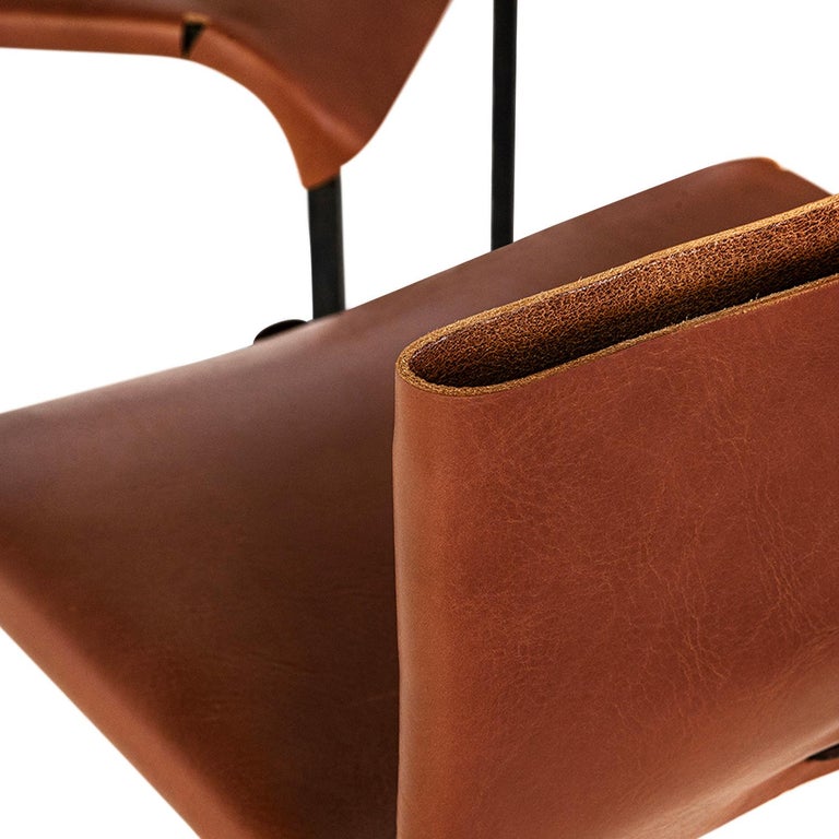 https://a.1stdibscdn.com/side-dining-chair-modern-contemporary-hand-made-in-blackened-steel-leather-for-sale-picture-6/f_30173/f_131741511768699239630/JMS022924_Brown_Leather_Chairs_04_master.jpg?width=768