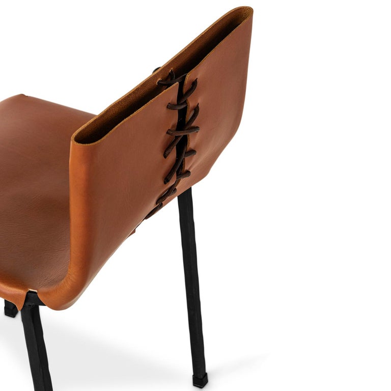 https://a.1stdibscdn.com/side-dining-chair-modern-contemporary-hand-made-in-blackened-steel-leather-for-sale-picture-5/f_30173/f_131741511768699239529/JMS022924_Brown_Leather_Chairs_05_master.jpg?width=768