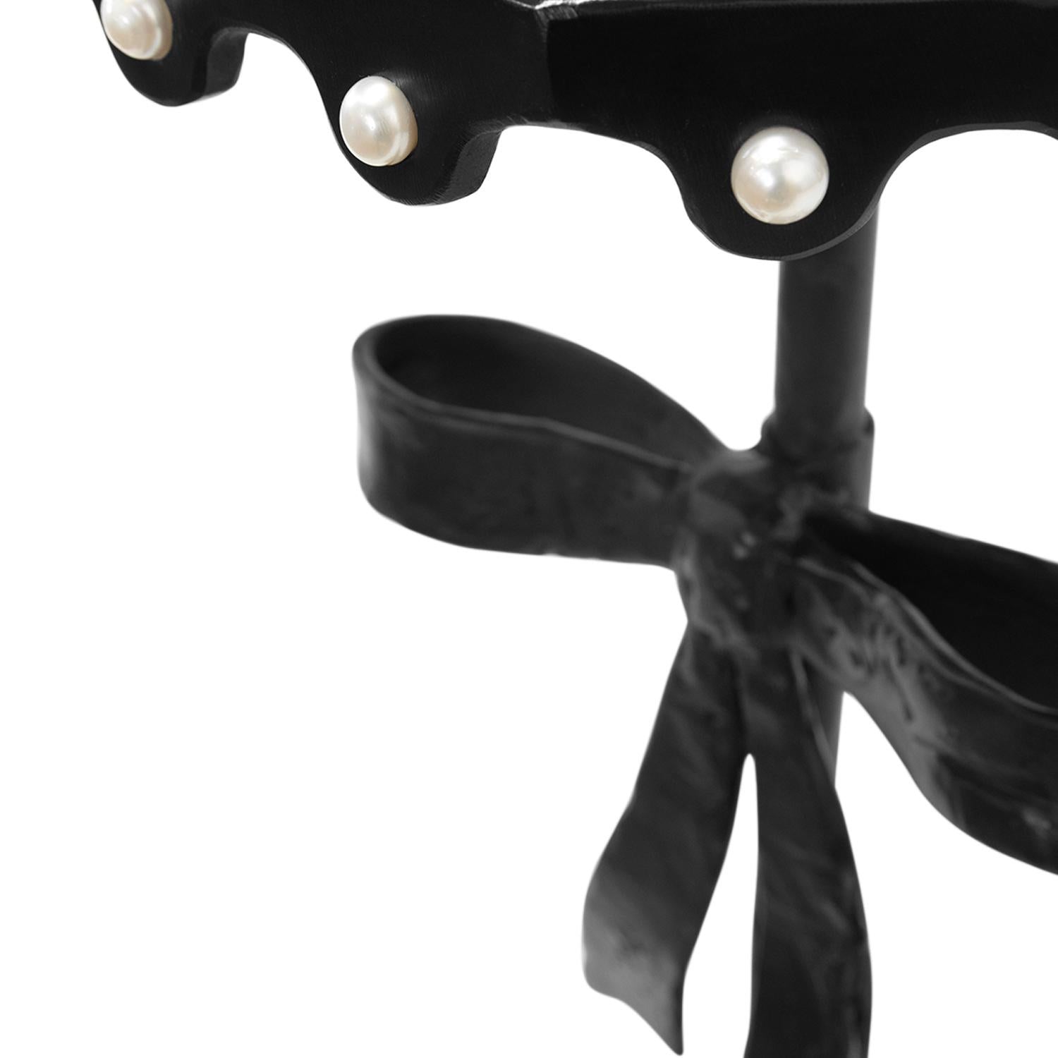 https://a.1stdibscdn.com/cocktail-table-modern-handshaped-round-blackened-and-waxed-steel-with-sea-pearls-for-sale-picture-4/f_30173/f_350198521768793664687/JMS050223_BowTable3_byNB_master.jpg