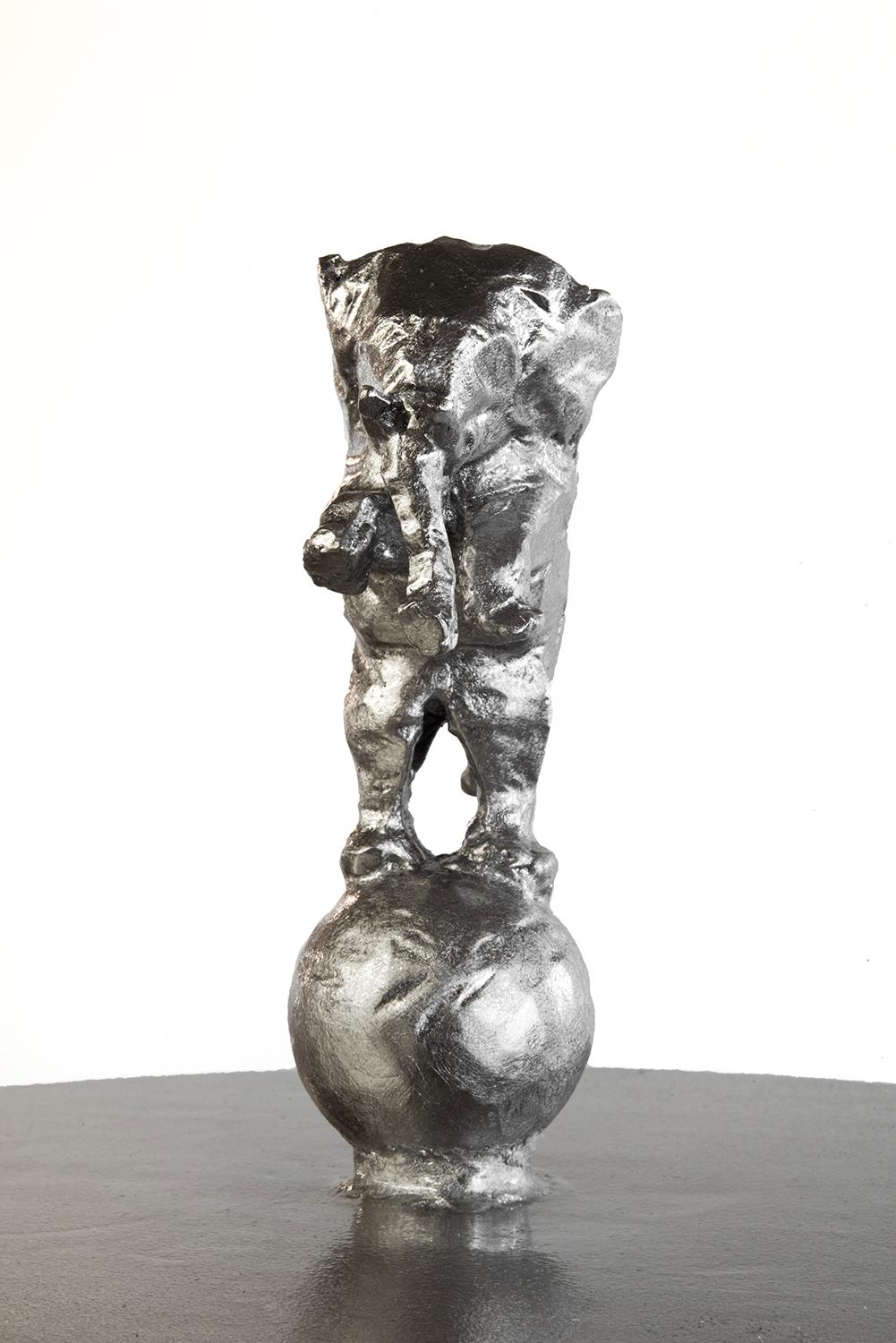 https://a.1stdibscdn.com/cocktail-side-table-modern-handshaped-round-silver-palladium-leaf-sculpture-for-sale-picture-2/f_30173/f_350237721688085546468/JMS060323_palladium_elephant_spirit_2_byNB_master.jpg
