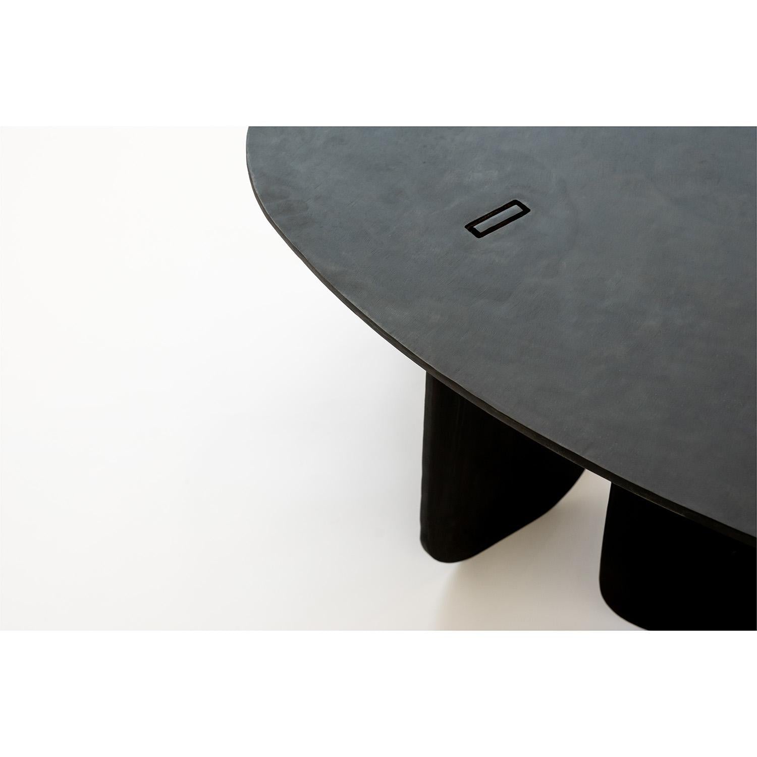 https://a.1stdibscdn.com/black-modern-contemporary-blackened-steel-uniquely-circular-end-side-table-for-sale-picture-2/f_30173/f_219033221608672089726/JMS2020_TABLENO15_SIDETABLE_01_master.jpg