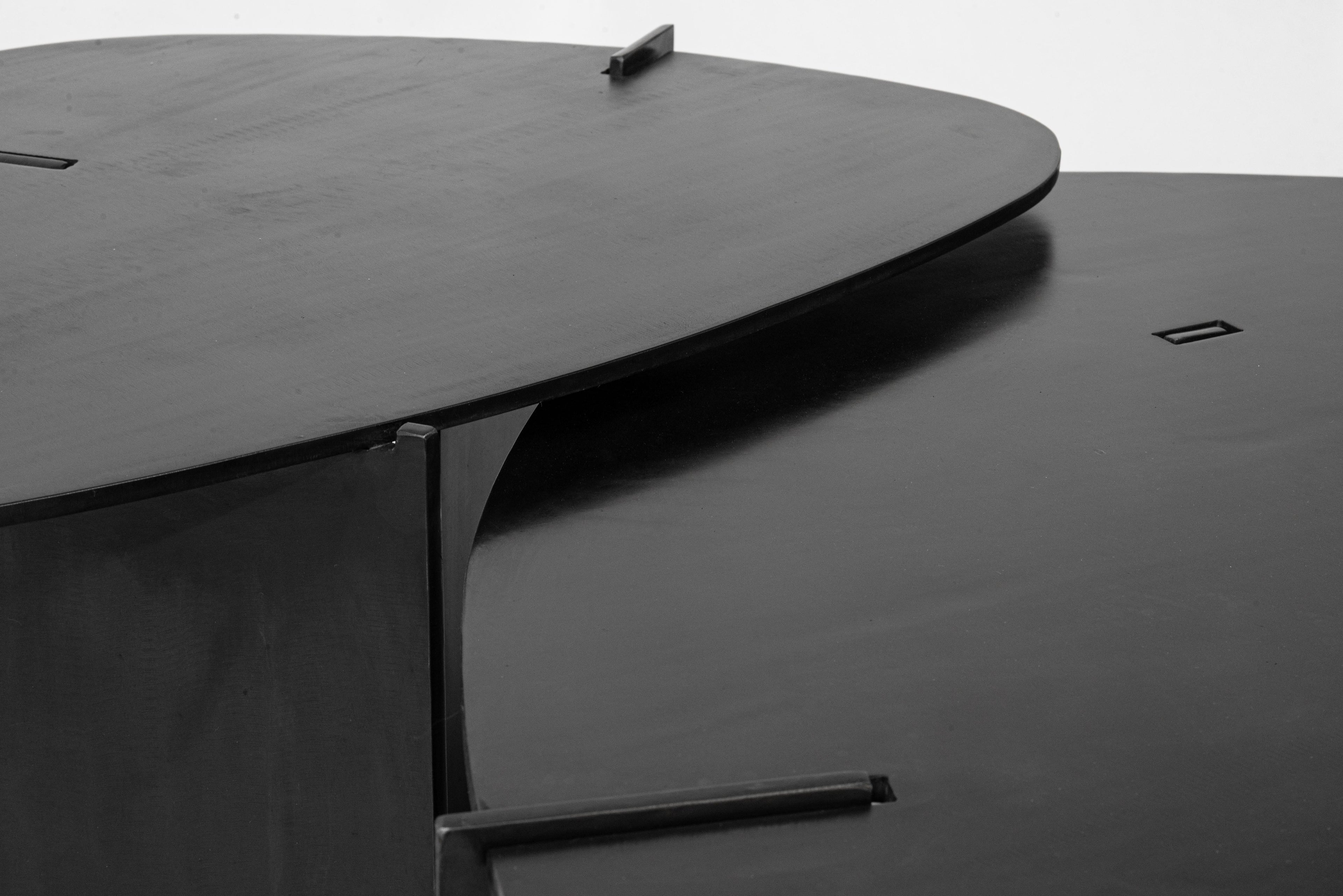 https://a.1stdibscdn.com/circular-end-side-table-unique-organic-black-modern-contemporary-waxed-steel-for-sale-picture-8/f_30173/f_219033221669932720173/JMS_table15_nesting_3_020122_master.jpg