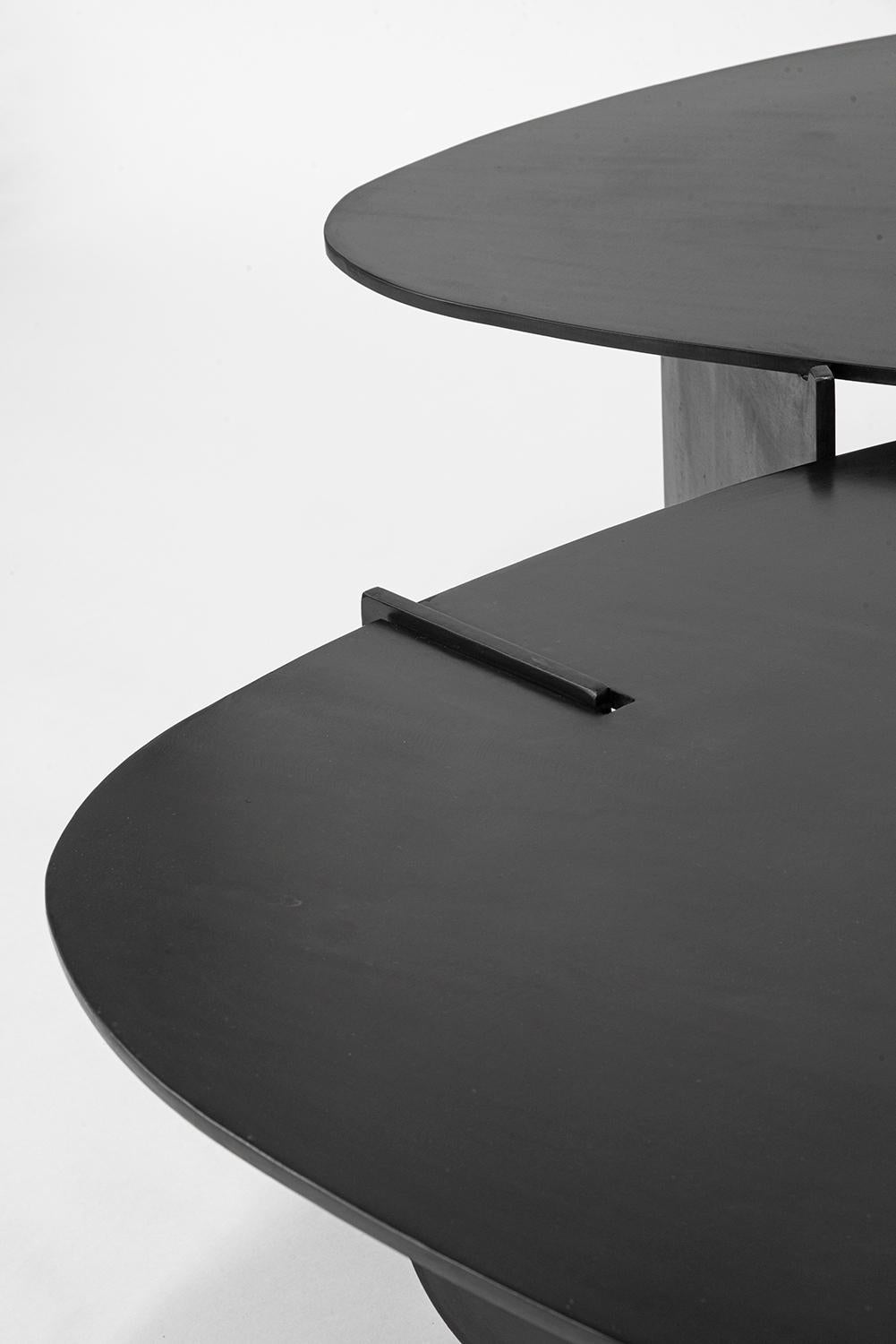 https://a.1stdibscdn.com/circular-end-side-table-unique-organic-black-modern-contemporary-waxed-steel-for-sale-picture-9/f_30173/f_219033221669932714181/JMS_table15_nesting_4_020122_master.jpg