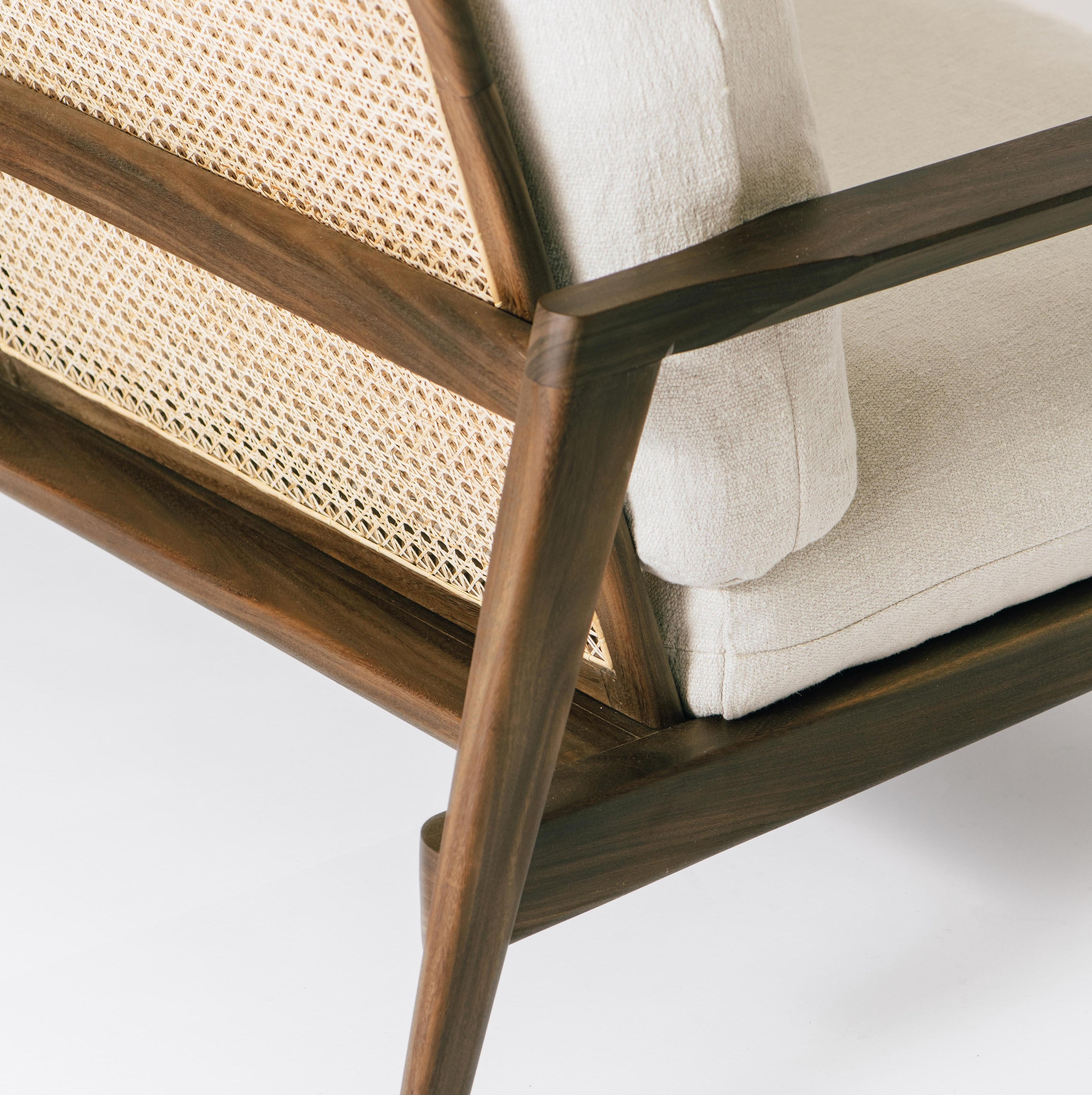 https://a.1stdibscdn.com/jaffna-sofa-mid-century-modern-style-linen-rattan-nedun-solid-wood-for-sale-picture-4/f_106092/f_469659721759927335138/Jaffna_Seating_Details_02_master.jpg
