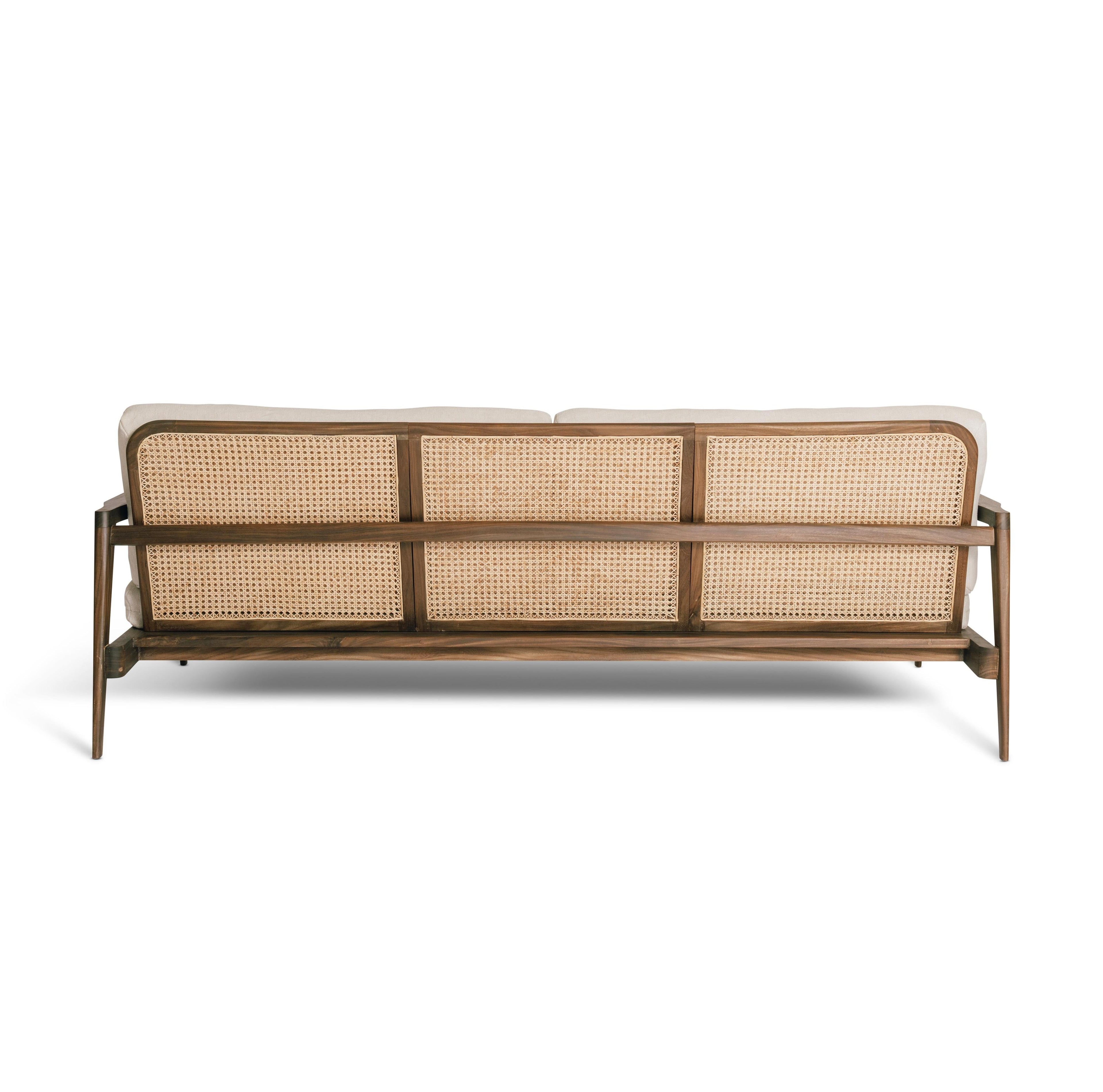 https://a.1stdibscdn.com/jaffna-sofa-mid-century-modern-style-linen-rattan-nedun-solid-wood-for-sale-picture-3/f_106092/f_469659721759927333281/Jaffna_Sofa_midnight_ash_01_master.jpeg