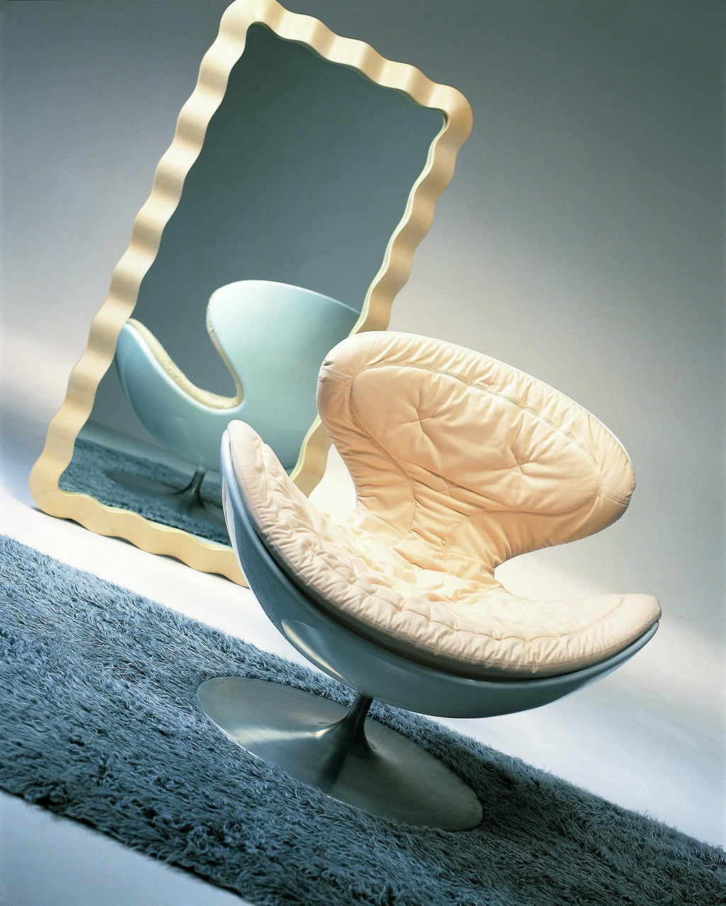 https://a.1stdibscdn.com/21st-century-jetsons-swivel-armchair-by-guglielmo-berchicci-stainless-steel-for-sale-picture-6/f_52352/1593614036519/Jetsons_ambientata_con_specchio_Copia_master.jpeg