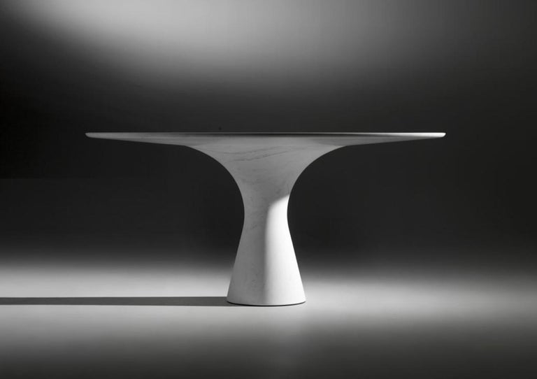 https://a.1stdibscdn.com/kynos-refined-contemporary-marble-dining-table-180-75-for-sale-picture-17/f_12192/f_319953521672428096085/Job_4365_1348x952_master.jpg?width=768