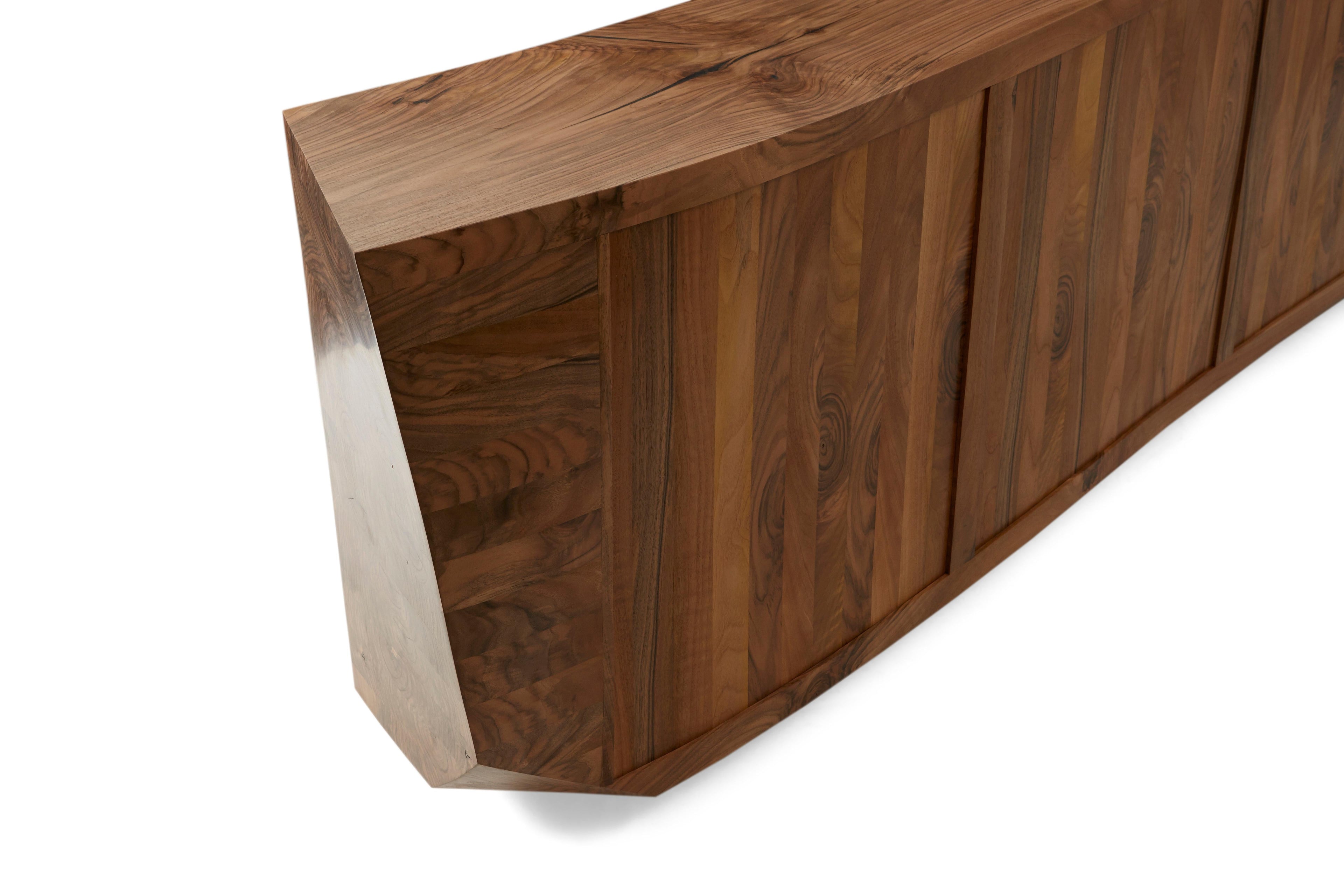 https://a.1stdibscdn.com/bespoke-asymmetrical-bookcase-of-solid-walnut-for-sale-picture-8/f_28993/f_366388621697459403112/Jon76972_master.jpg