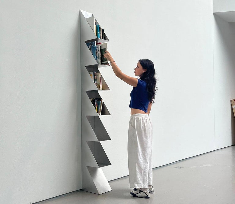 https://a.1stdibscdn.com/1234567-aluminum-bookshelf-by-clay-brown-for-sale-picture-7/f_37133/f_437856321740428311324/Julia2_master.jpg?width=768