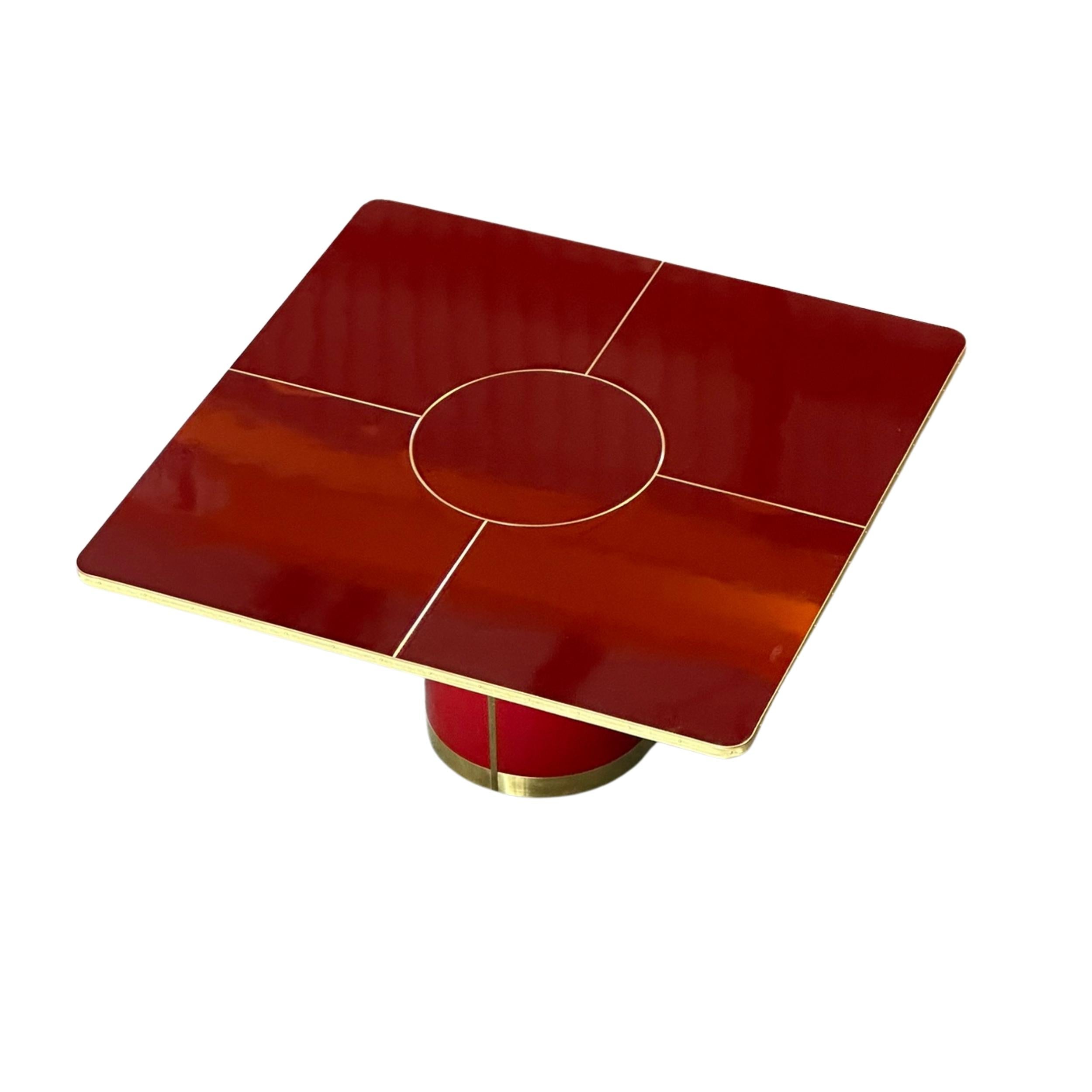 https://a.1stdibscdn.com/dining-table-with-pedestal-high-gloss-laminate-with-brass-marquetry-size-l-for-sale-picture-2/f_40561/f_394442521714131663767/Julieta_Square_Pedestal_Burgundy_master.jpg