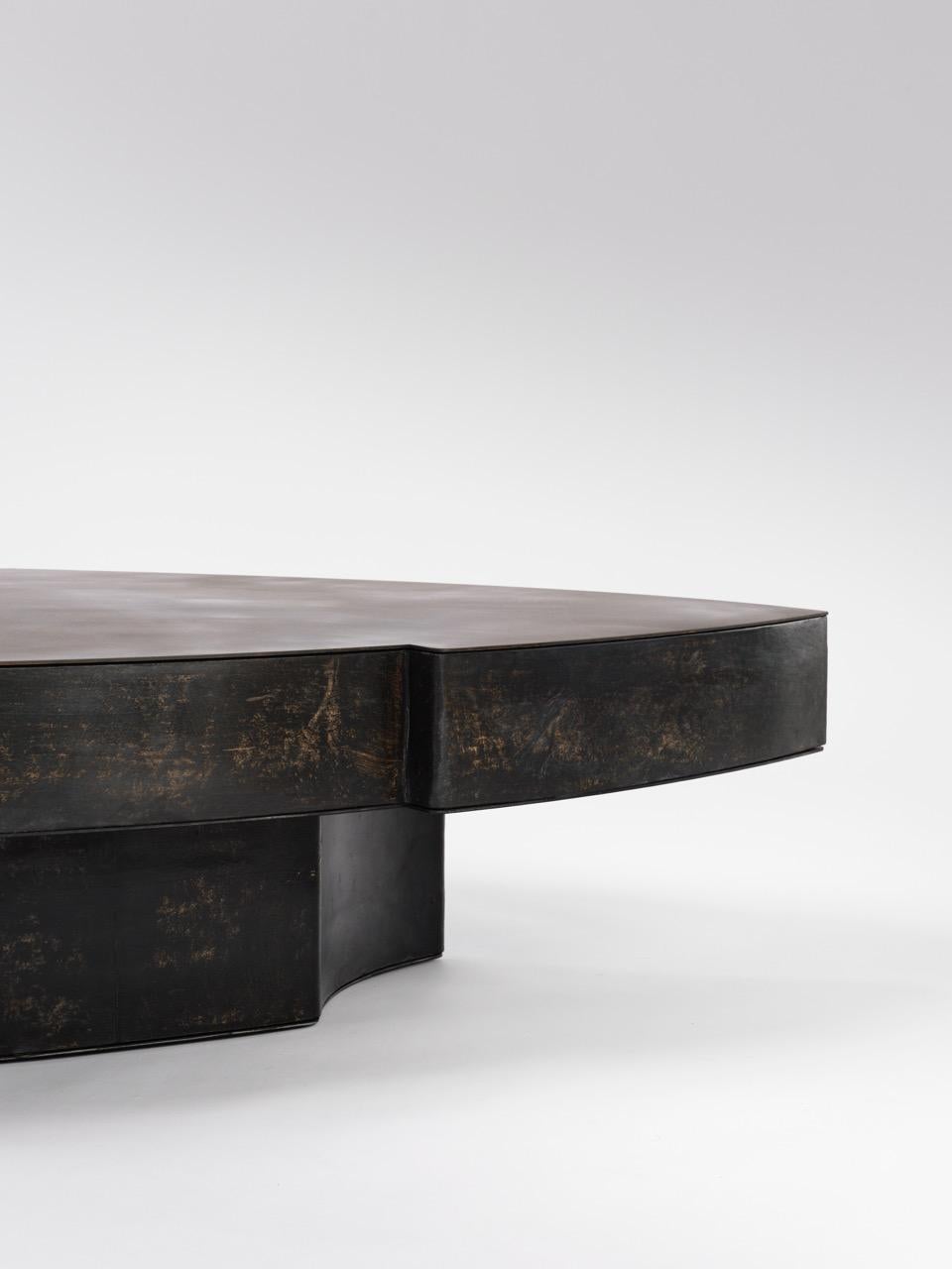 https://a.1stdibscdn.com/contemporary-fragment-coffee-table-ii-small-with-black-patinated-leather-for-sale-picture-3/f_70152/f_454853021750151893992/Jumandie_Seys_OWN_106_CedricVerhelst_Large_master.jpeg