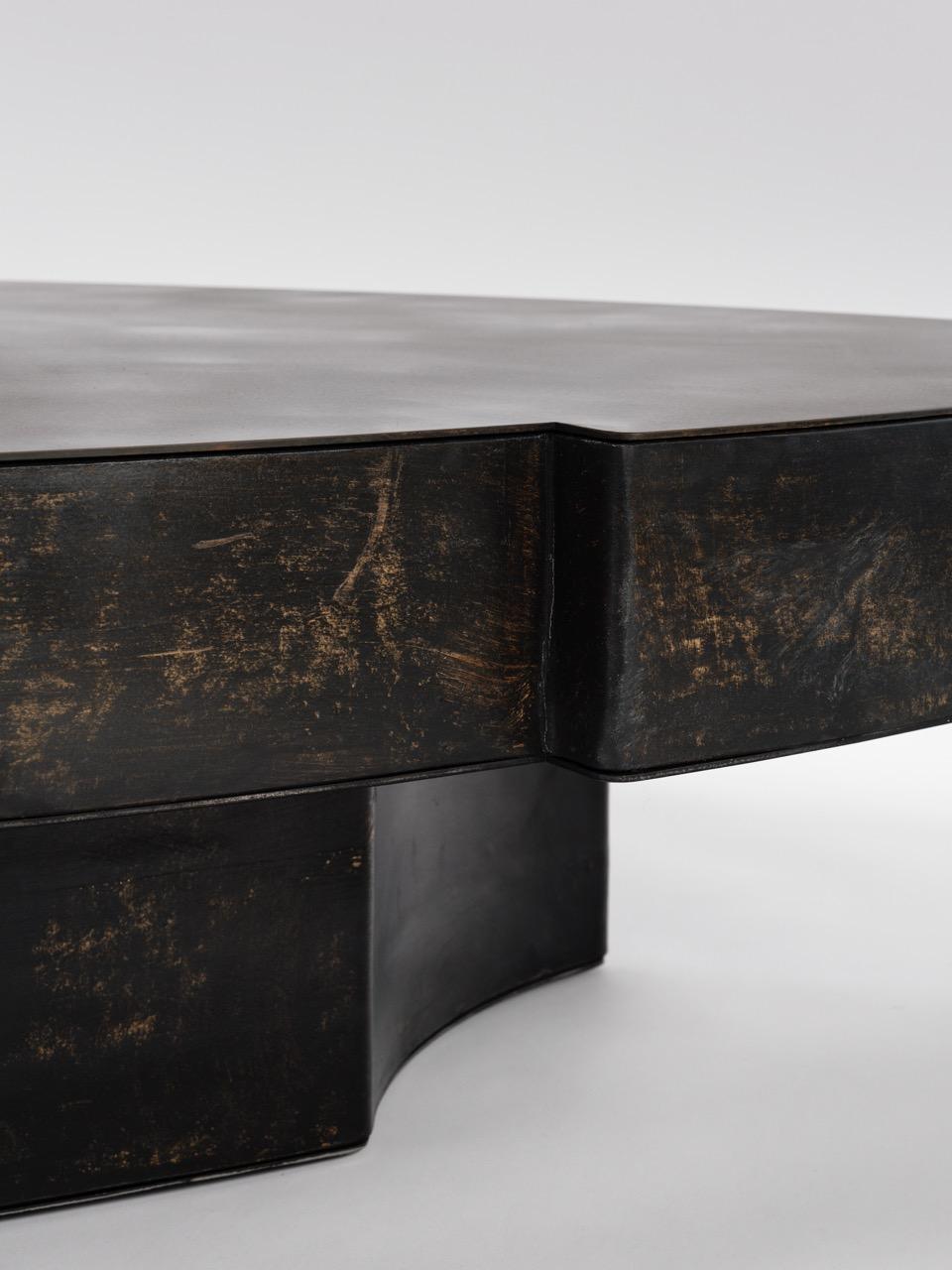 https://a.1stdibscdn.com/contemporary-fragment-coffee-table-ii-small-with-black-patinated-leather-for-sale-picture-5/f_70152/f_454853021750151894668/Jumandie_Seys_OWN_108_CedricVerhelst_Large_master.jpeg