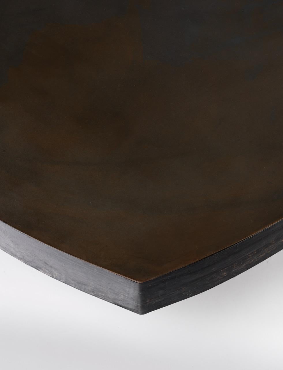 https://a.1stdibscdn.com/contemporary-fragment-dining-table-burgundy-patinated-leather-for-sale-picture-6/f_70152/f_437891521741082766533/Jumandie_Seys_OWN_109_CedricVerhelst_Large_master.jpeg