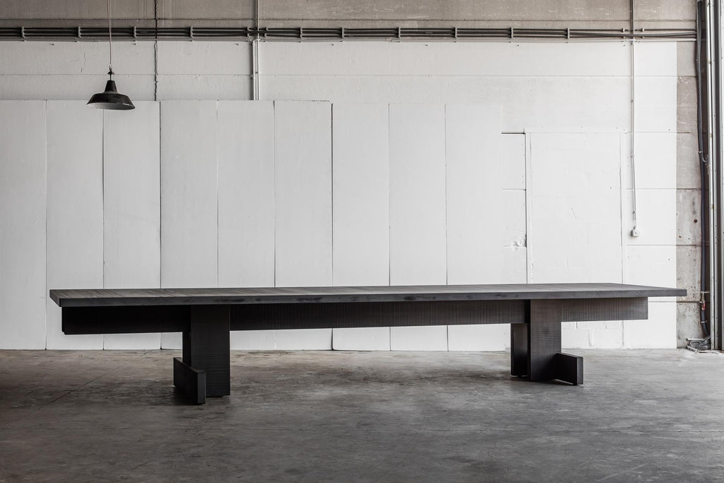 https://a.1stdibscdn.com/16-5-wide-brutalist-wood-dining-table-for-sale-picture-3/f_27693/f_333002621678868011733/KOMBINAT_indoor_black_2__master.jpg