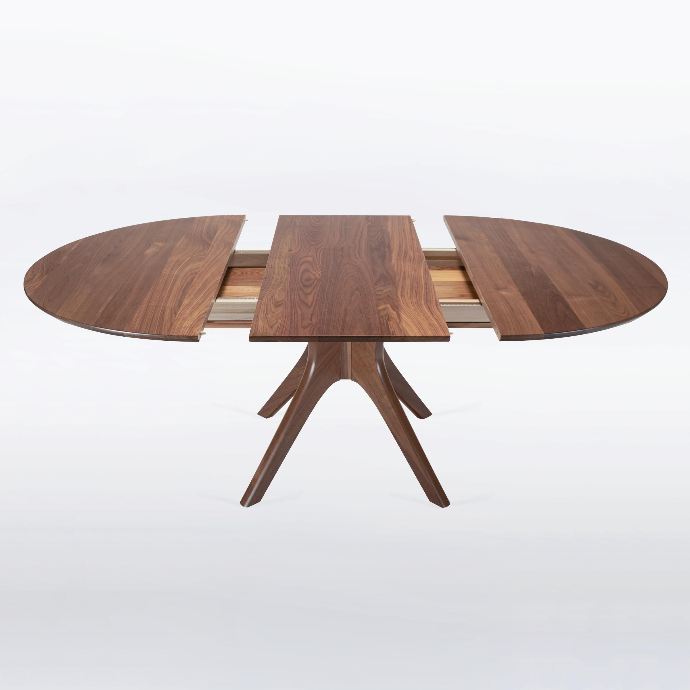 https://a.1stdibscdn.com/round-extendable-pedestal-dining-table-54-with-leaf-handmade-solid-walnut-for-sale-picture-8/f_97932/f_420691321730132125094/Kapok_expanding_2_square__master.jpg