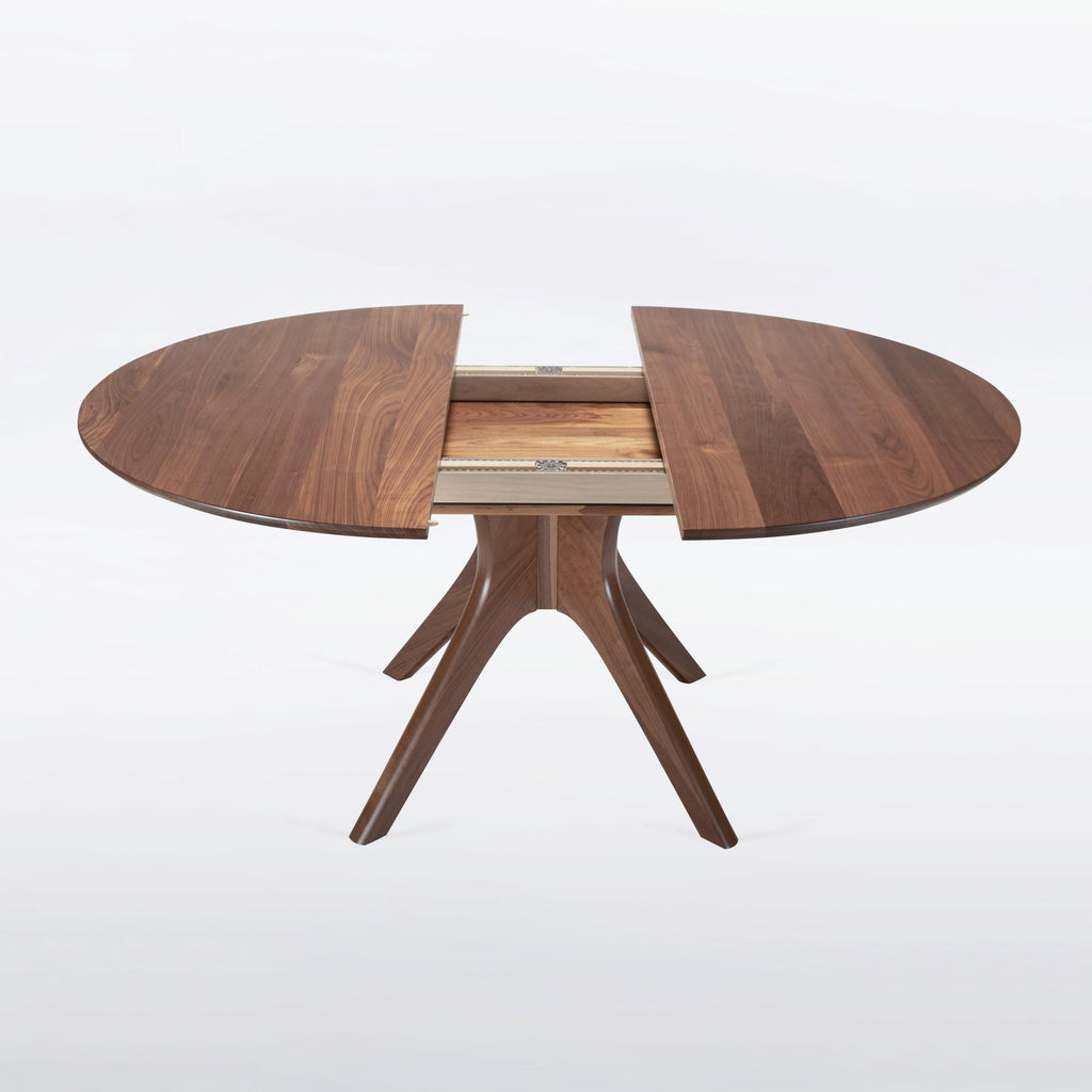 https://a.1stdibscdn.com/round-extendable-dining-table-with-leaf-and-pedestal-base-handmade-solid-walnut-for-sale-picture-7/f_97932/f_420684921730130256921/Kapok_expanding_3_square__master.jpg