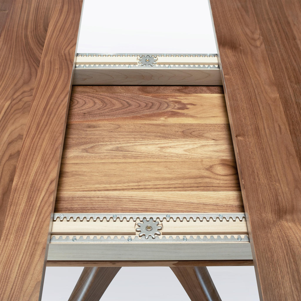 https://a.1stdibscdn.com/round-extendable-dining-table-with-leaf-and-pedestal-base-handmade-solid-walnut-for-sale-picture-9/f_97932/f_420684921730130257416/Kapok_expanding_5_square__master.jpg