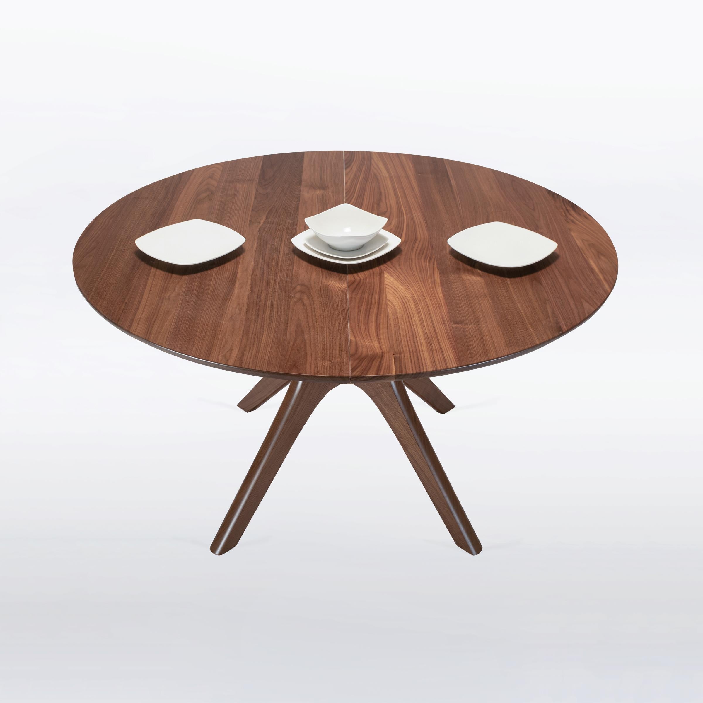 https://a.1stdibscdn.com/round-extendable-dining-table-with-leaf-and-pedestal-base-handmade-solid-walnut-for-sale-picture-11/f_97932/f_420684921730130280367/Kapok_expanding_8_square__master.jpg