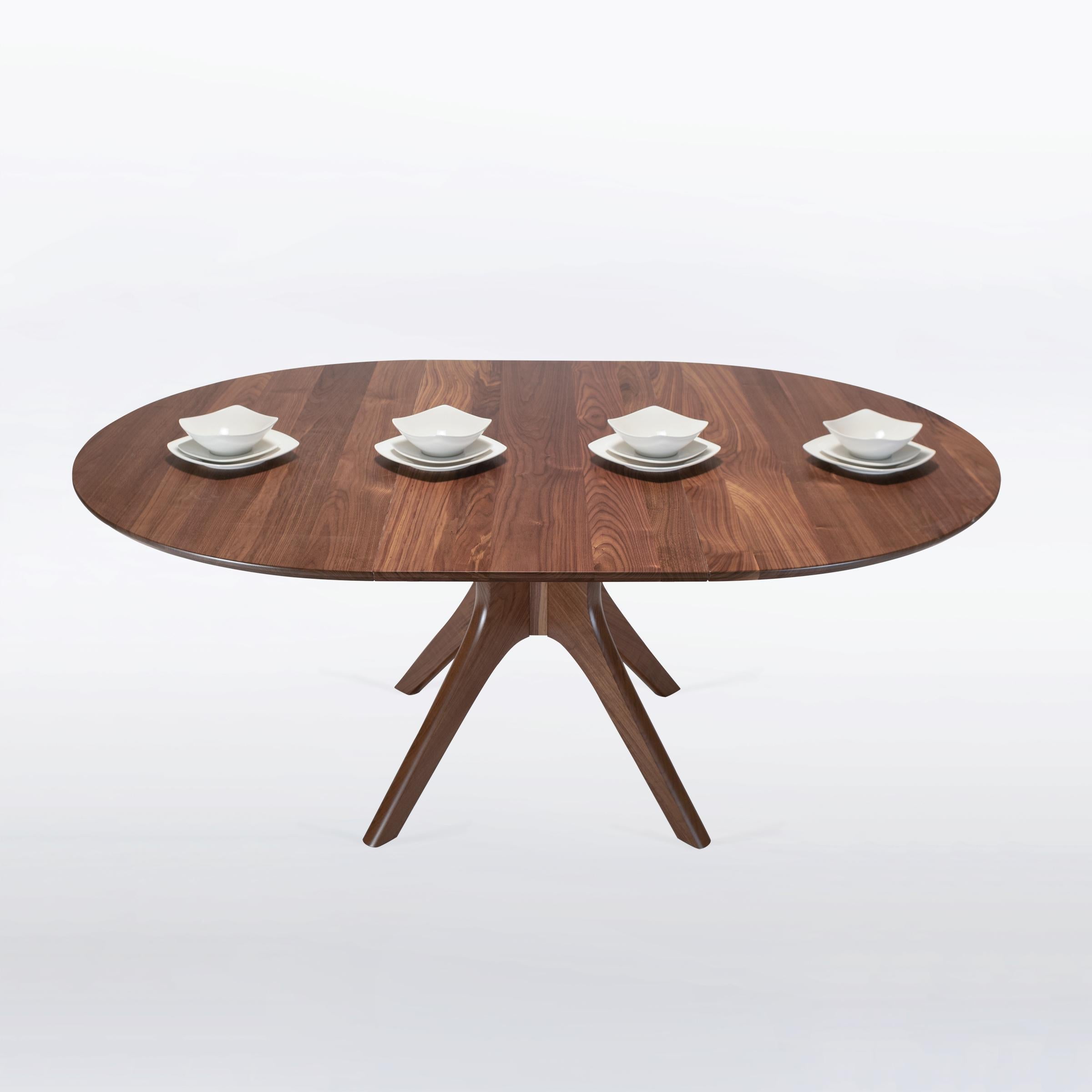 https://a.1stdibscdn.com/round-extendable-dining-table-with-leaf-and-pedestal-base-handmade-solid-walnut-for-sale-picture-12/f_97932/f_420684921730130280371/Kapok_expanding_9_square__master.jpg