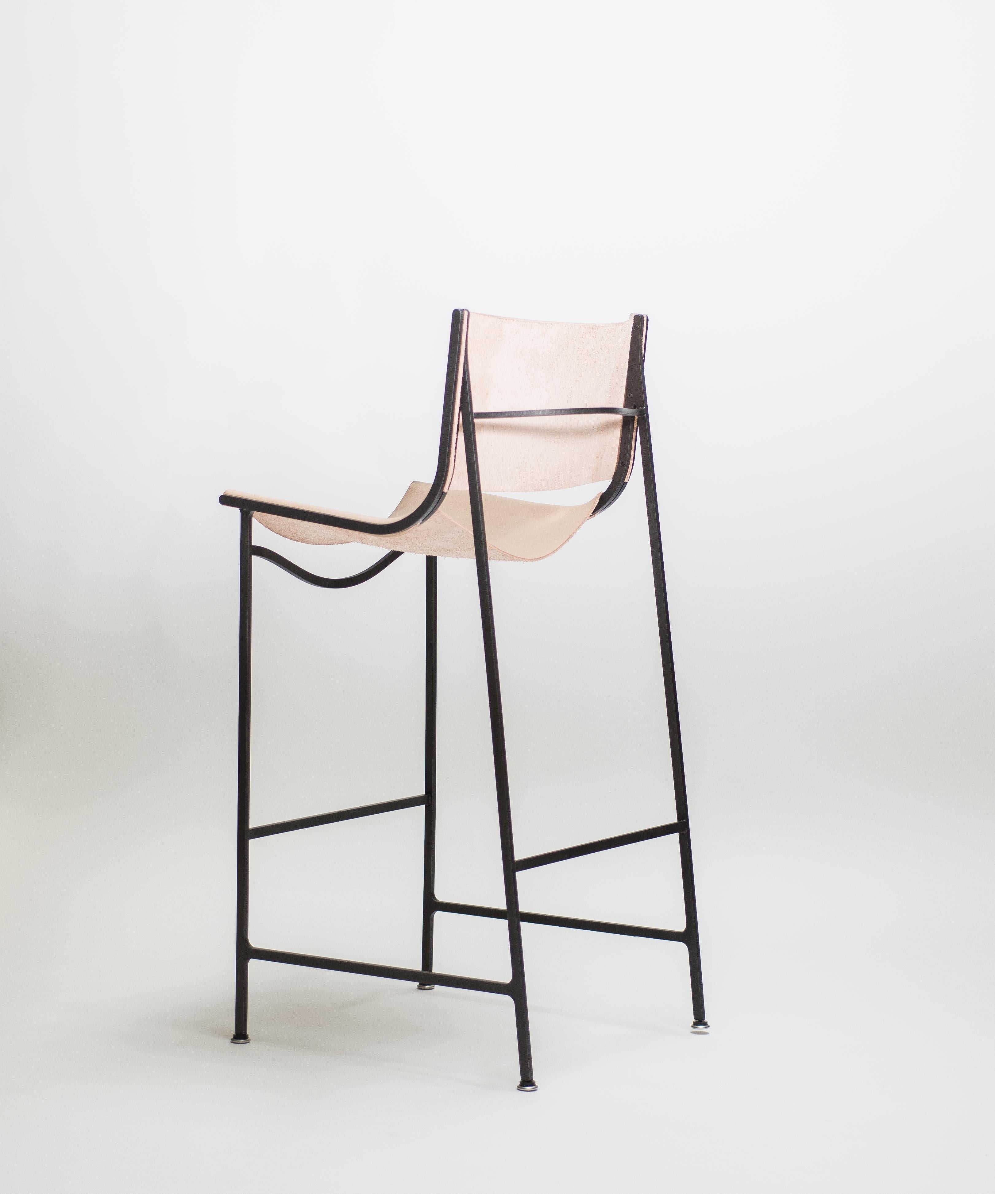 https://a.1stdibscdn.com/bar-stool-in-blackened-laser-cut-steel-frame-and-veg-tan-leather-sling-for-sale-picture-2/f_28533/f_152181921561423632158/Klein_Home_Bar_Stool_GH_4_master.jpg