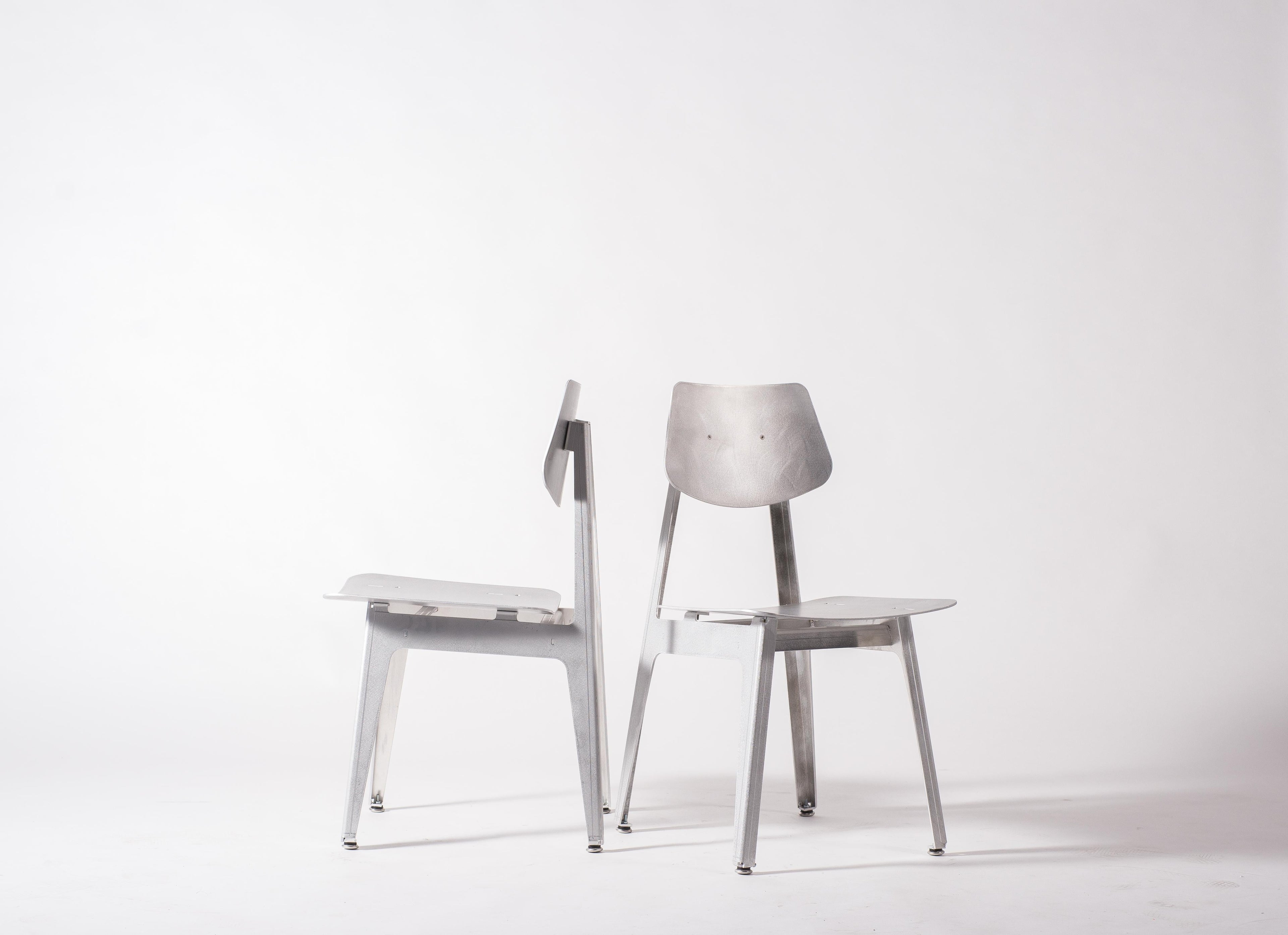 https://a.1stdibscdn.com/matte-aluminum-dining-chair-bt-for-sale-picture-4/f_28533/f_152181421561422712831/Klein_Home_Dining_Chair_BT_17_master.jpg