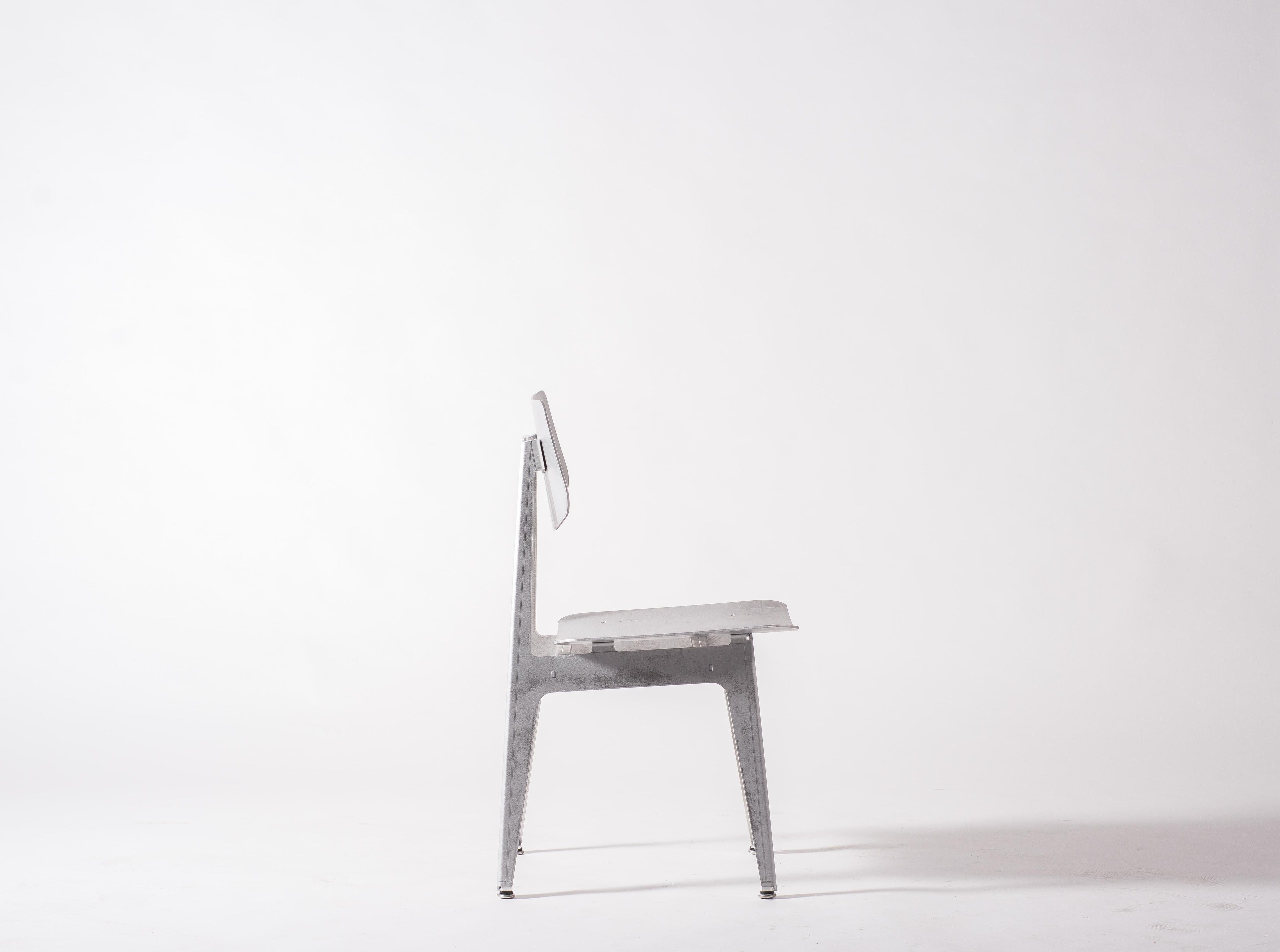 https://a.1stdibscdn.com/matte-aluminum-dining-chair-bt-for-sale-picture-2/f_28533/f_152181421561422717805/Klein_Home_Dining_Chair_BT_19_master.jpg