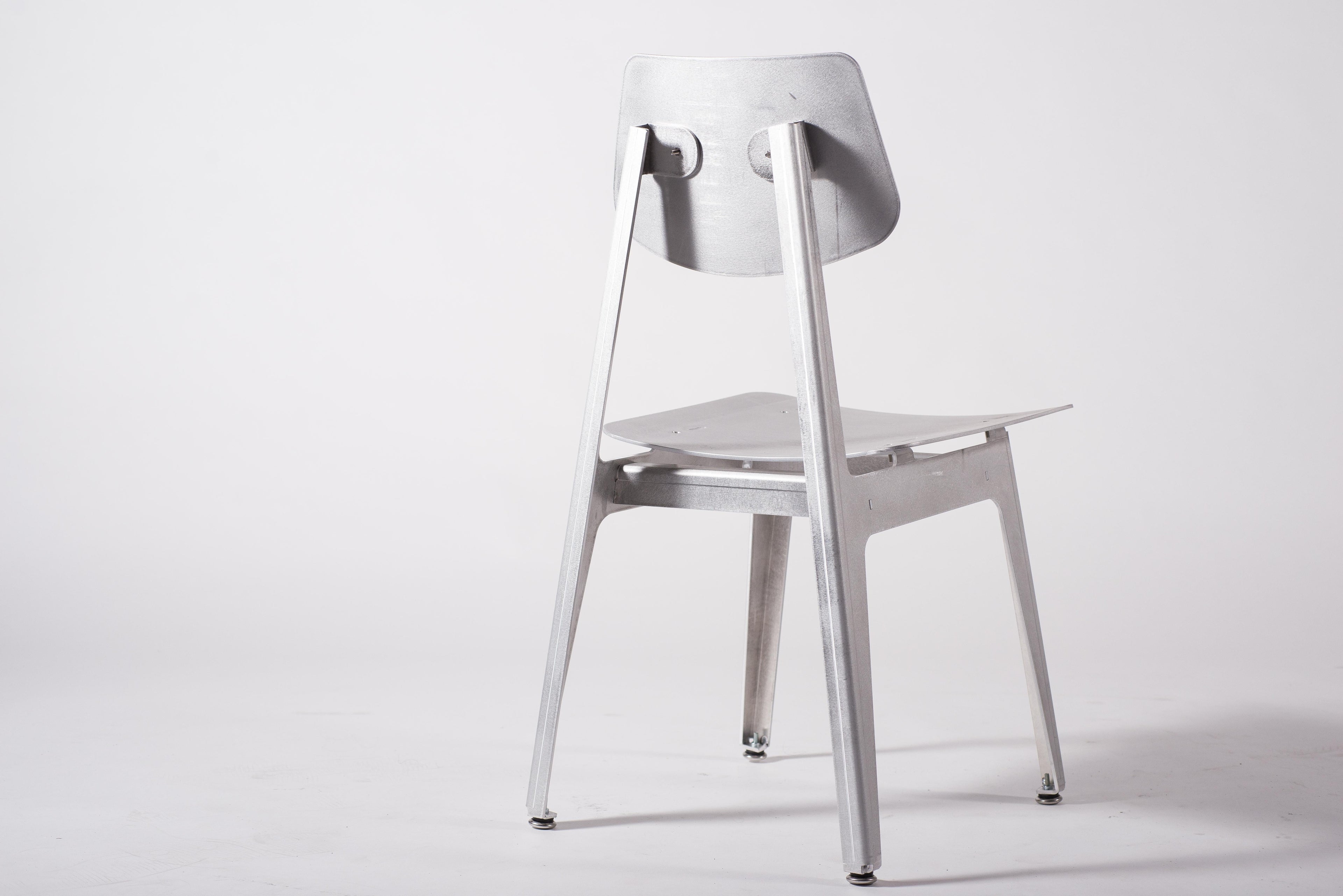 https://a.1stdibscdn.com/matte-aluminum-dining-chair-bt-for-sale-picture-3/f_28533/f_152181421561422630427/Klein_Home_Dining_Chair_BT_2_master.jpg