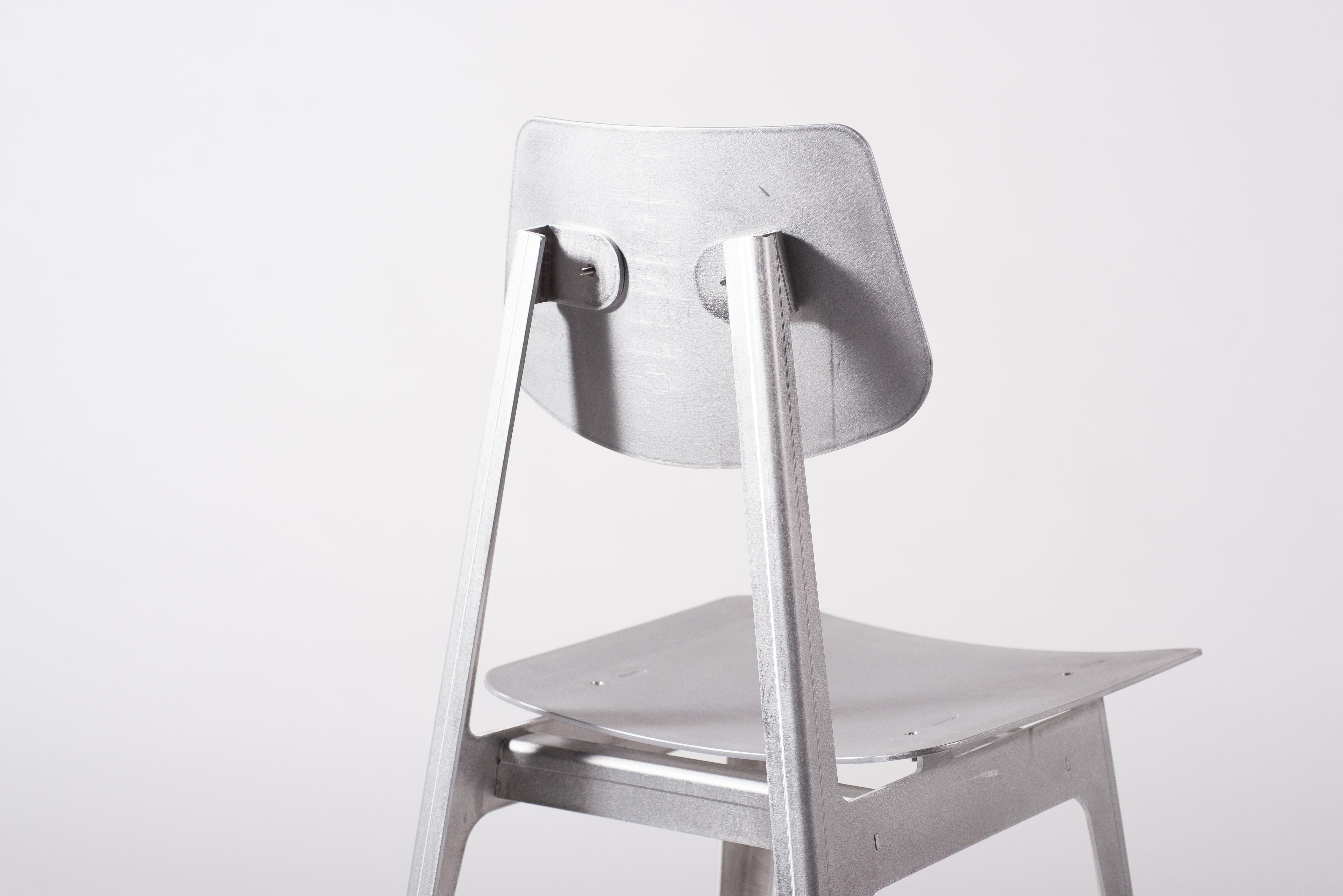https://a.1stdibscdn.com/matte-aluminum-dining-chair-bt-for-sale-picture-8/f_28533/f_152181421561422641437/Klein_Home_Dining_Chair_BT_4_master.jpg