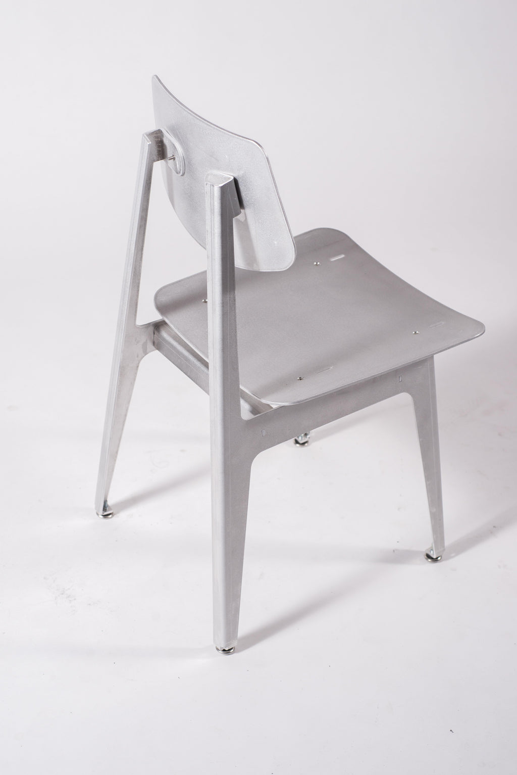 https://a.1stdibscdn.com/matte-aluminum-dining-chair-bt-for-sale-picture-6/f_28533/f_152181421561422672507/Klein_Home_Dining_Chair_BT_7_master.jpg