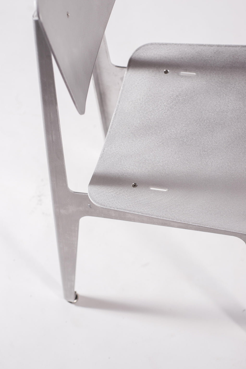 https://a.1stdibscdn.com/matte-aluminum-dining-chair-bt-for-sale-picture-7/f_28533/f_152181421561422684130/Klein_Home_Dining_Chair_BT_8_master.jpg