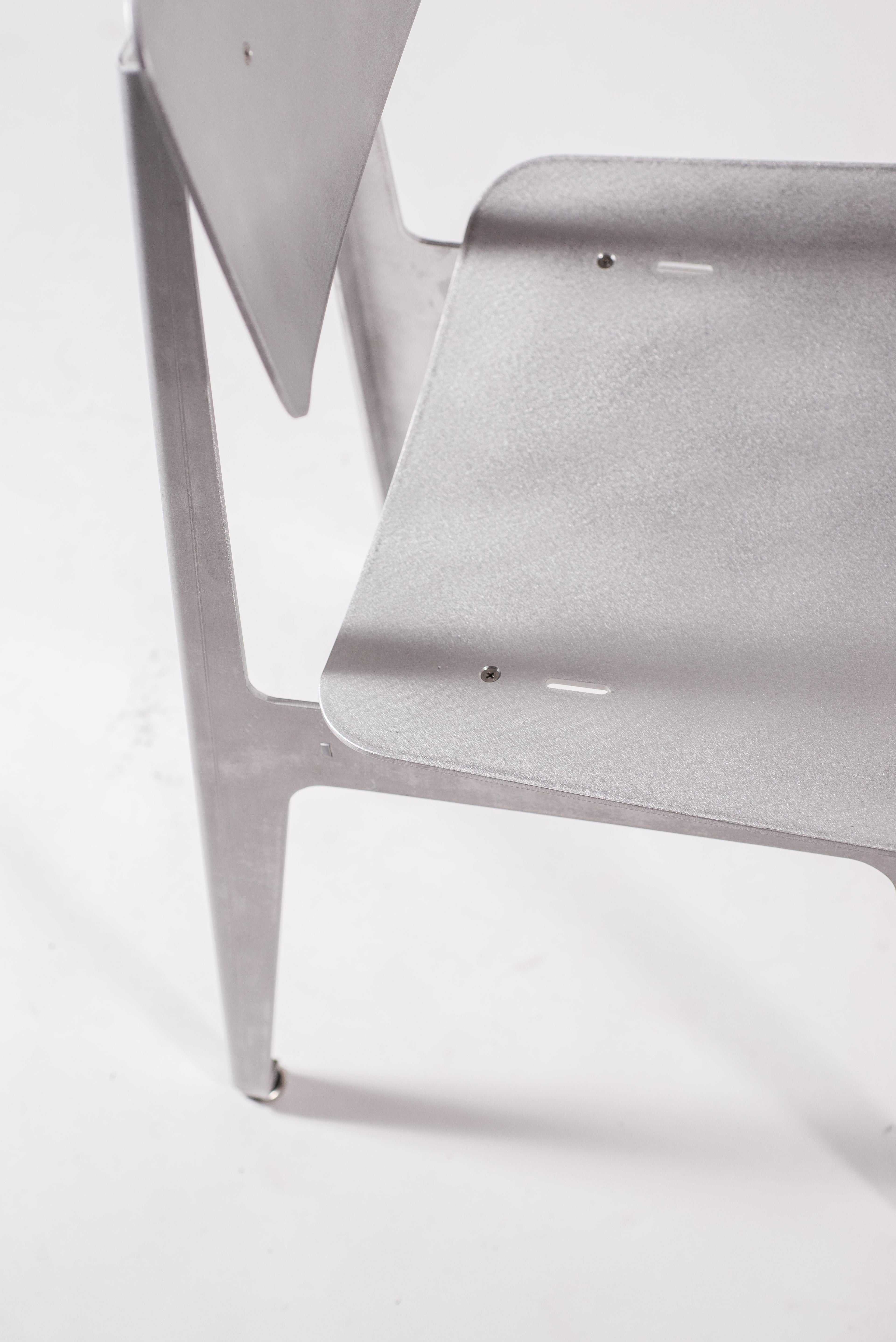 https://a.1stdibscdn.com/matte-aluminum-dining-chair-bt-for-sale-picture-7/f_28533/f_152181421561422684130/Klein_Home_Dining_Chair_BT_8_master.jpg