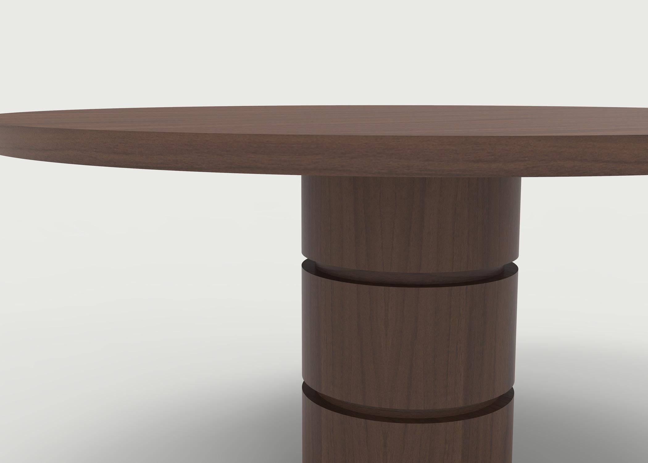 https://a.1stdibscdn.com/wood-dining-table-with-solid-top-and-cylindrical-base-with-special-cut-details-for-sale-picture-2/f_40261/1603994376440/LF_Upholstery62_master.jpg
